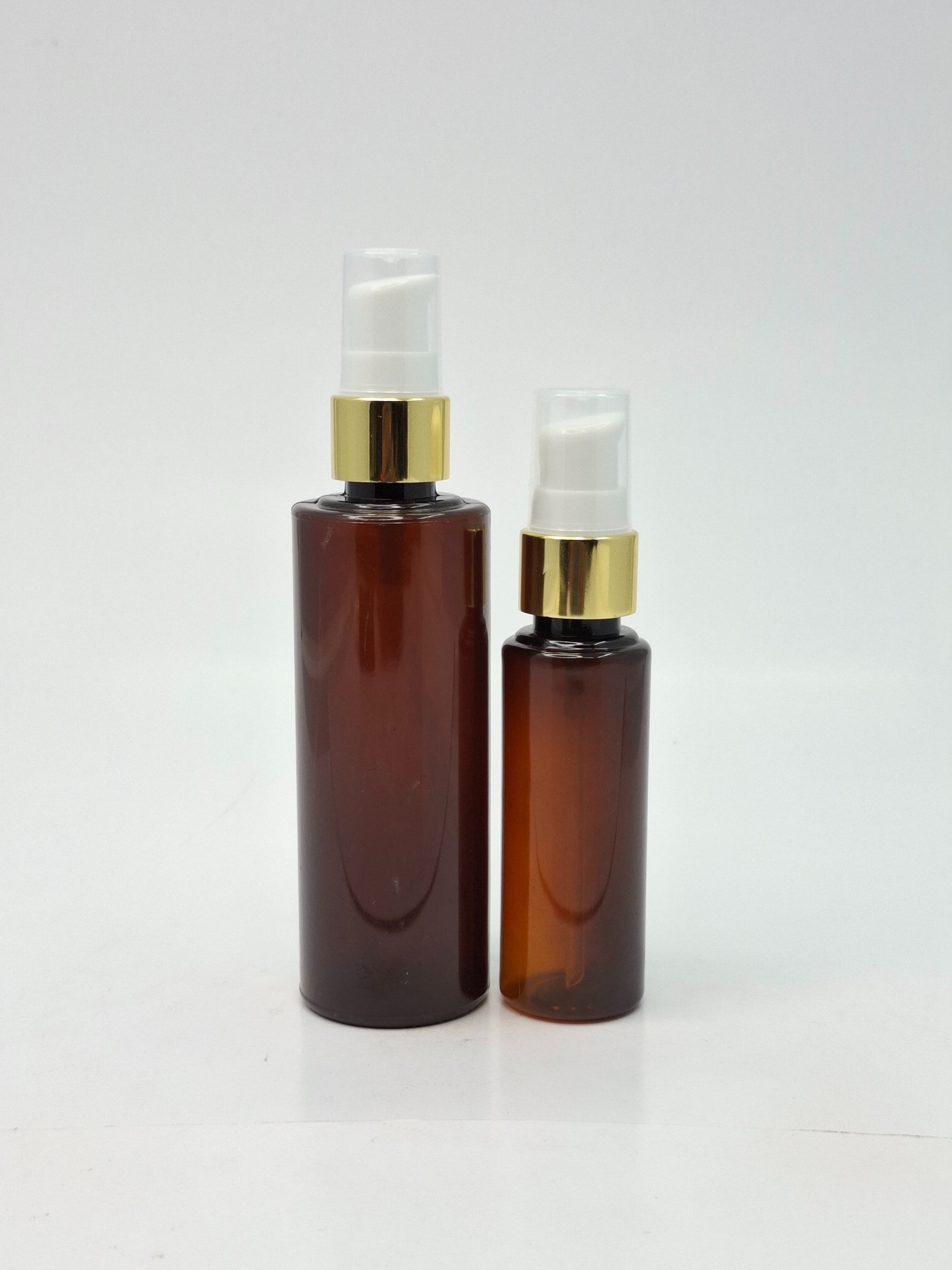 Main image of 50ml-100ml Round Bottle Amber - Cream Pump Gold
