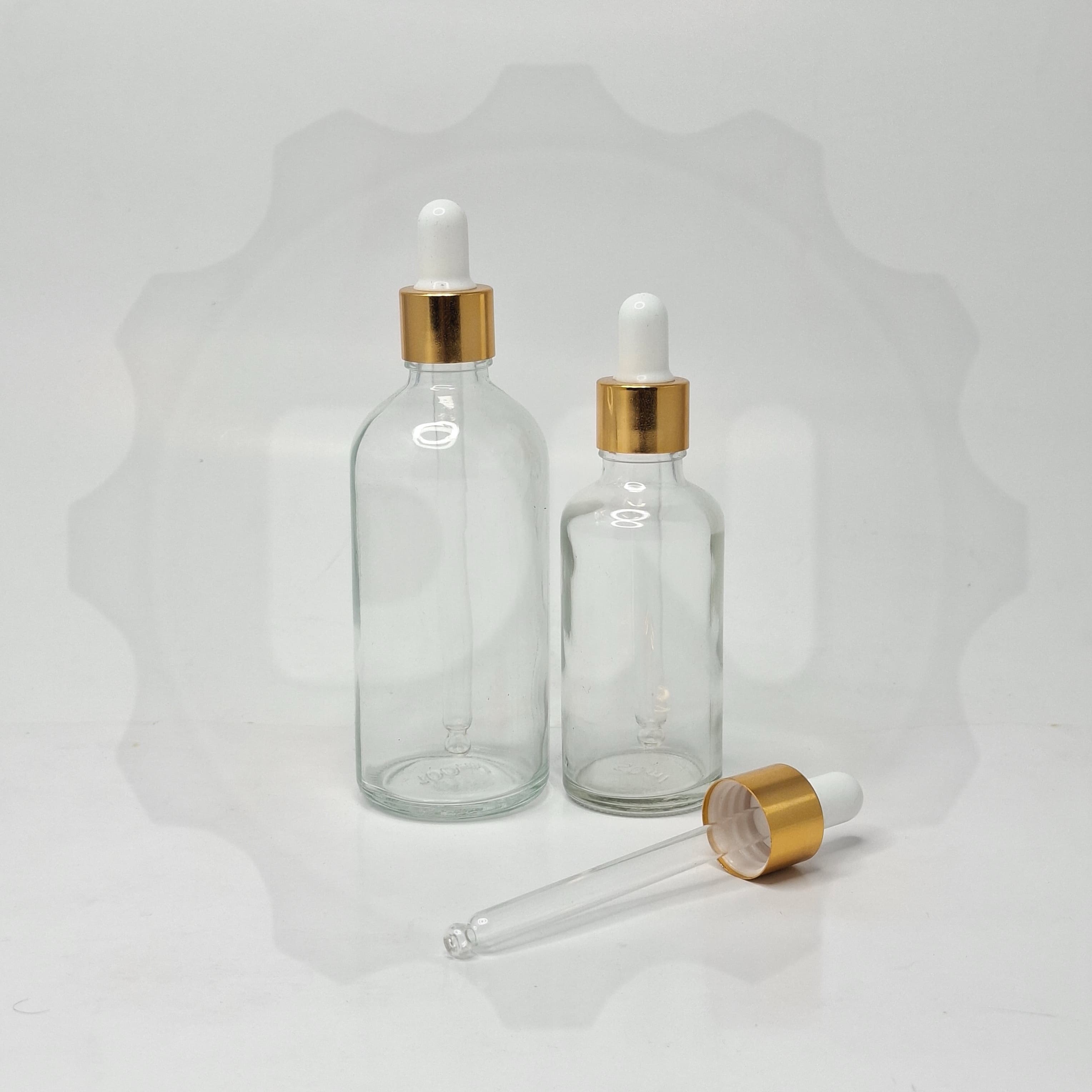 Main image of Clear Glass Serum Bottle - Gold / White