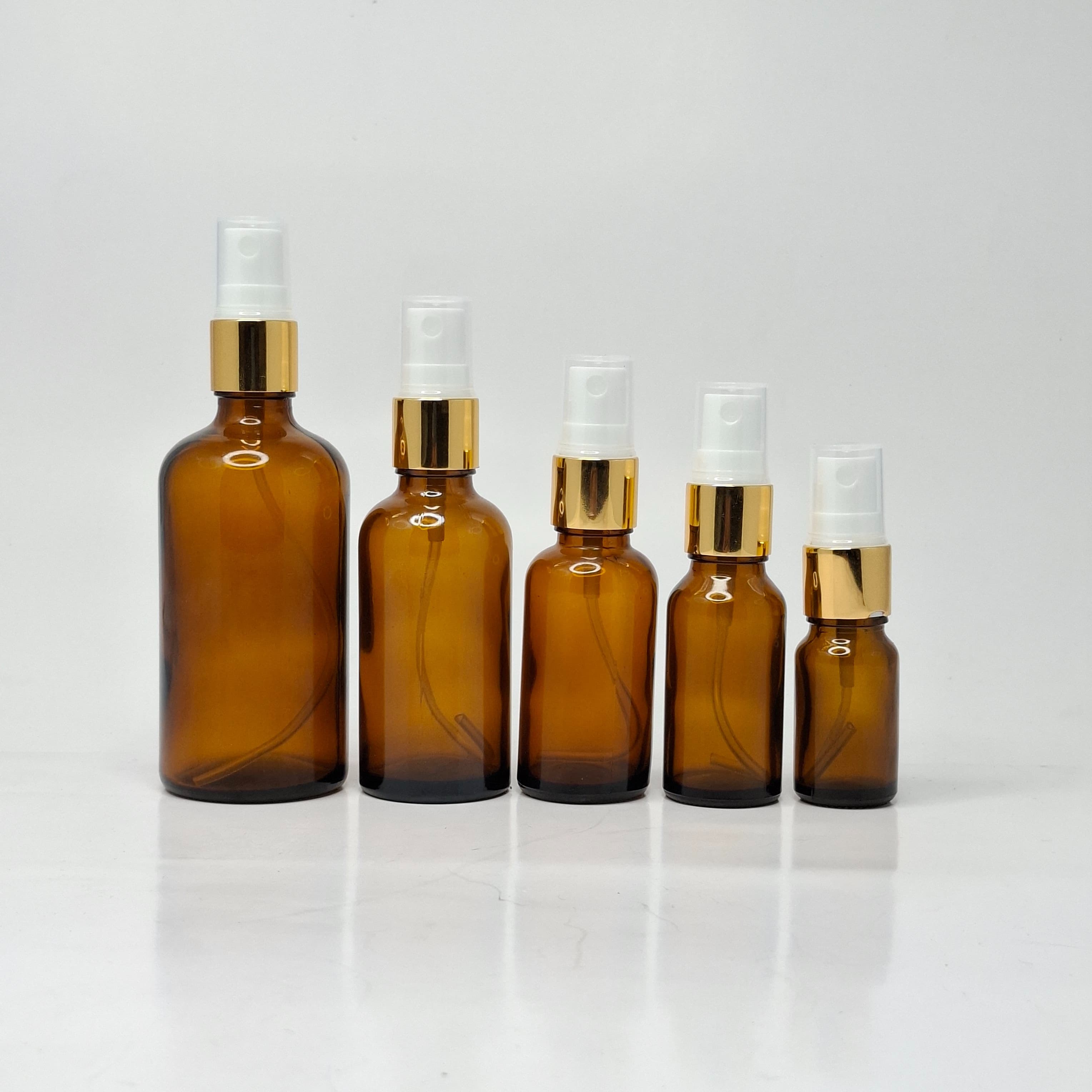Main image of Amber Glass Bottle - Gold Spray