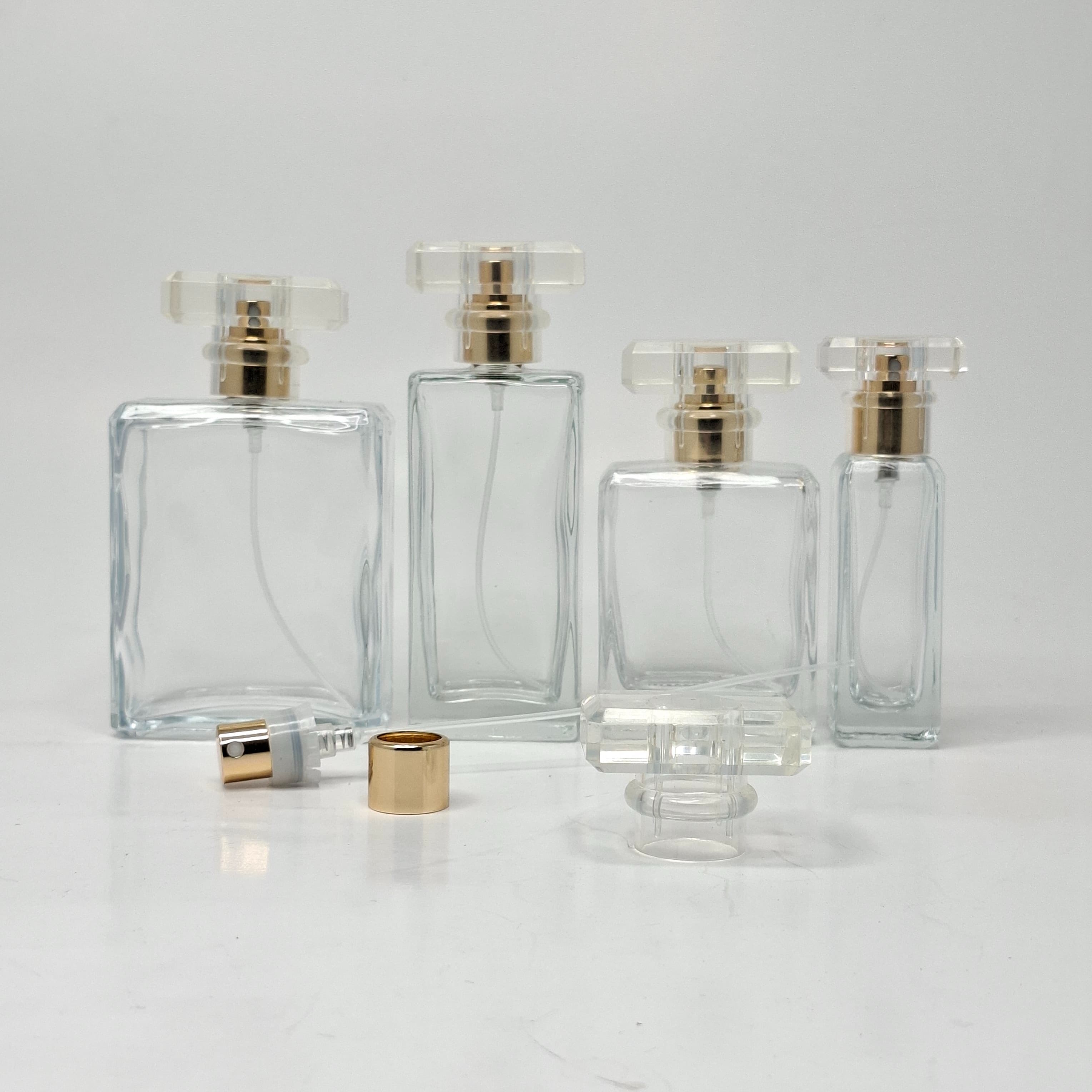 Main image of Square Glass Perfume Bottle -Gold spray With Square Lid