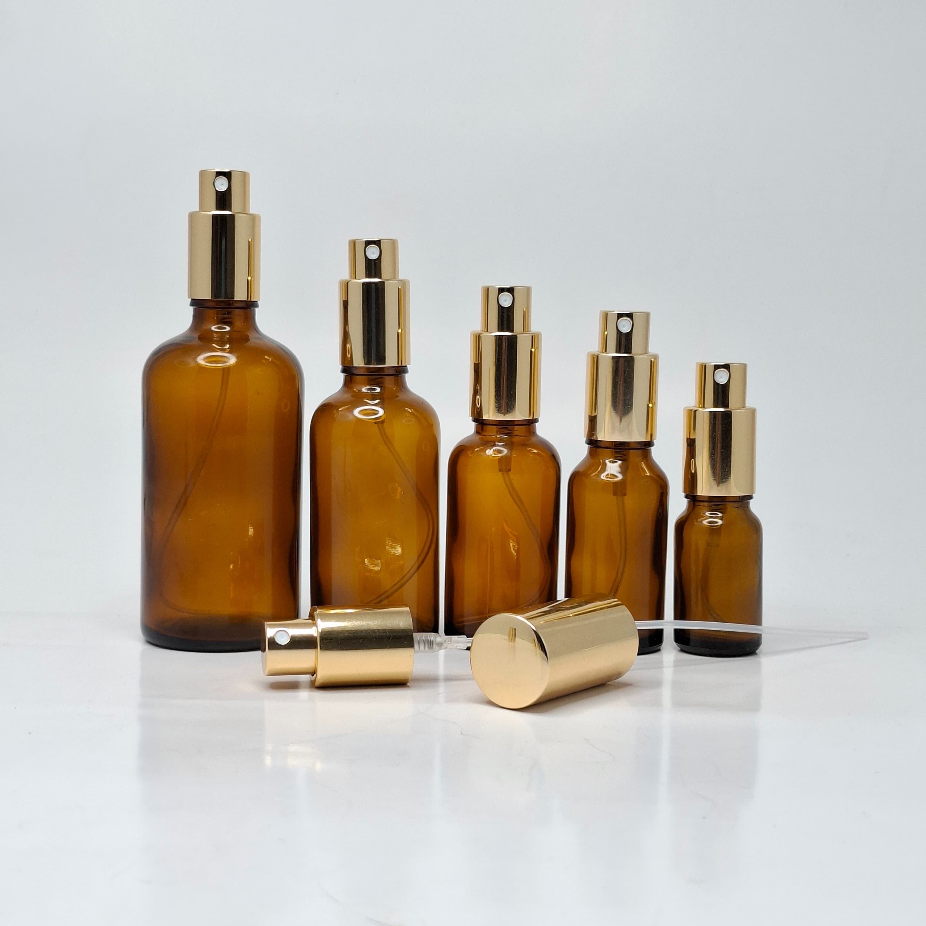 Main image of Amber Glass Bottle - Full Cover Gold Spray