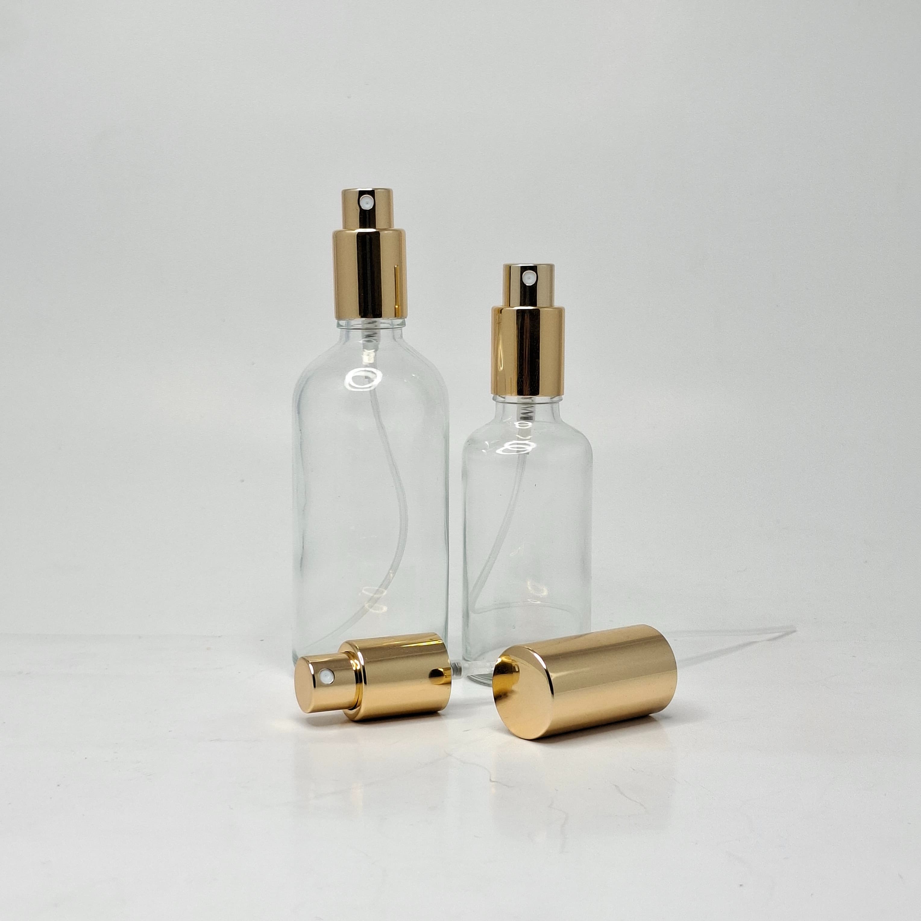Main image of Clear Glass Bottle - Full Cover Gold Spray 