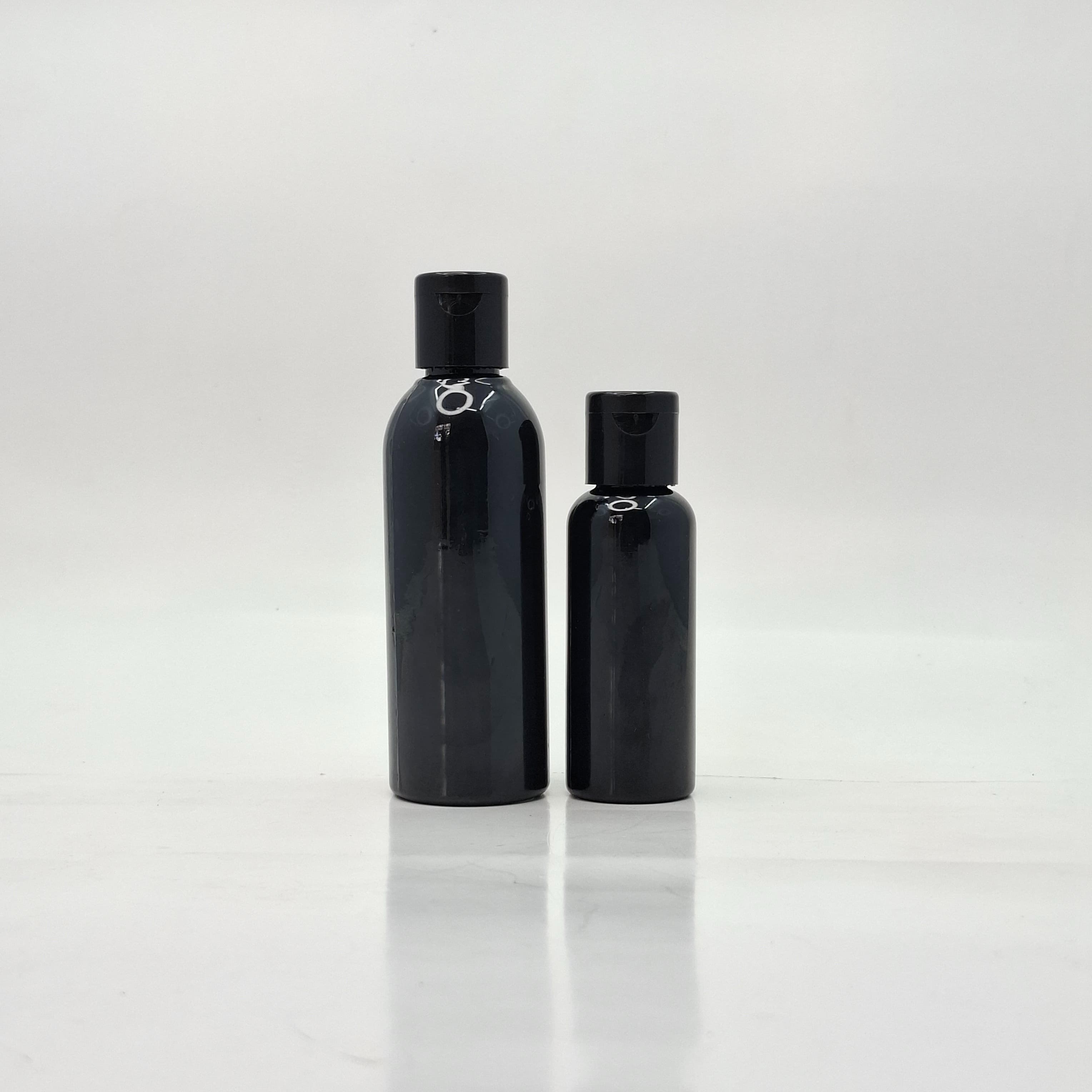 Main image of 50m-100ml Round Black Bottle - Flip Top Lids Black