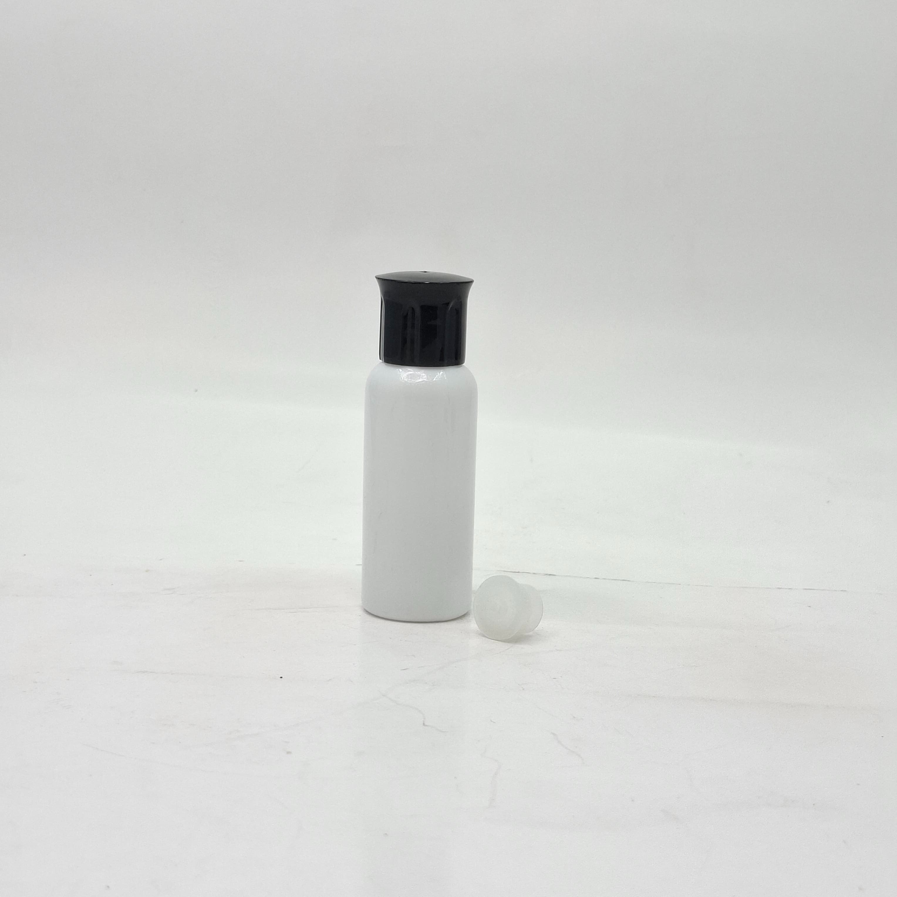Main image of 40ml Round Bottle White-Oil Lid Black