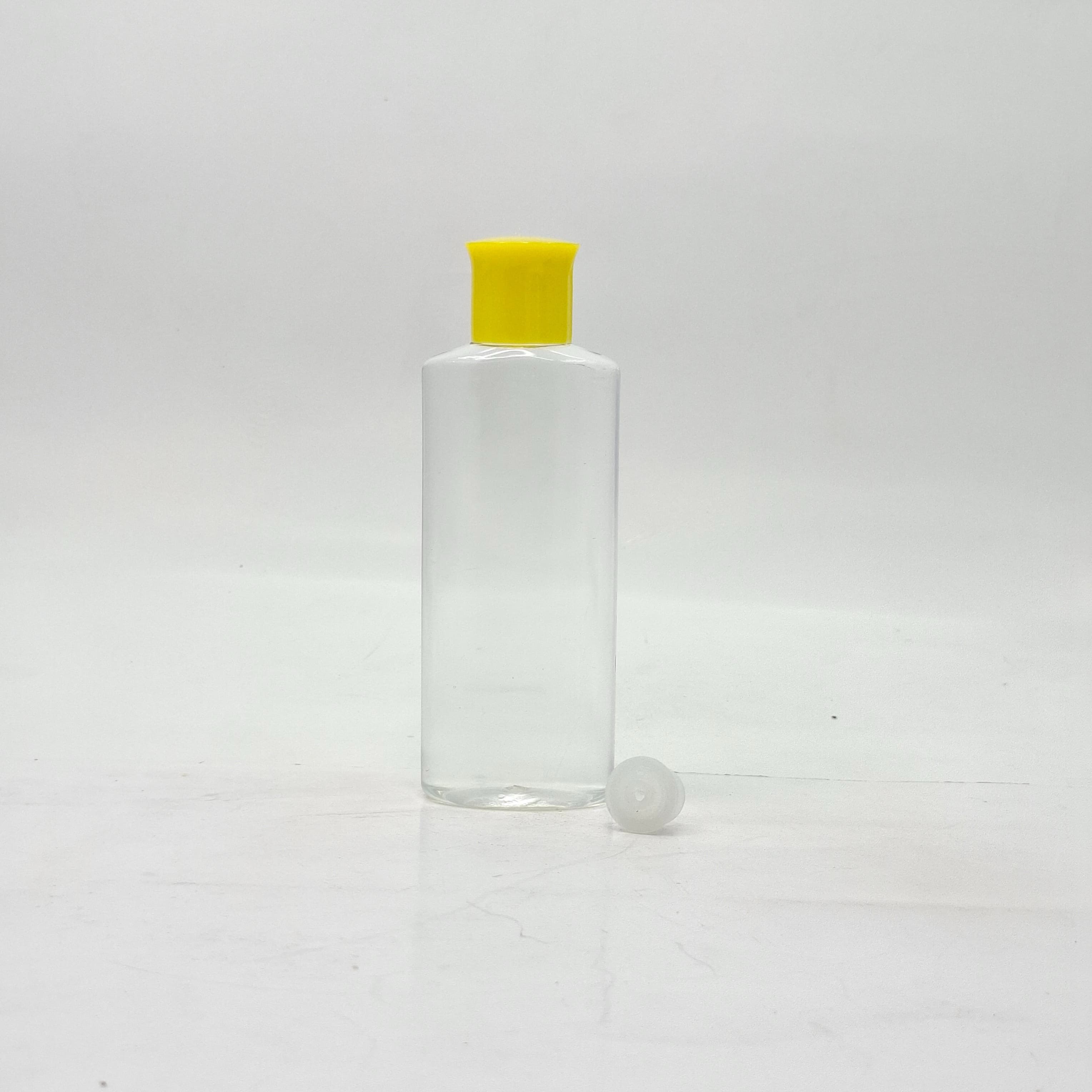 Main image of 100ml Oval Bottle Clear - Oil Lid Yellow