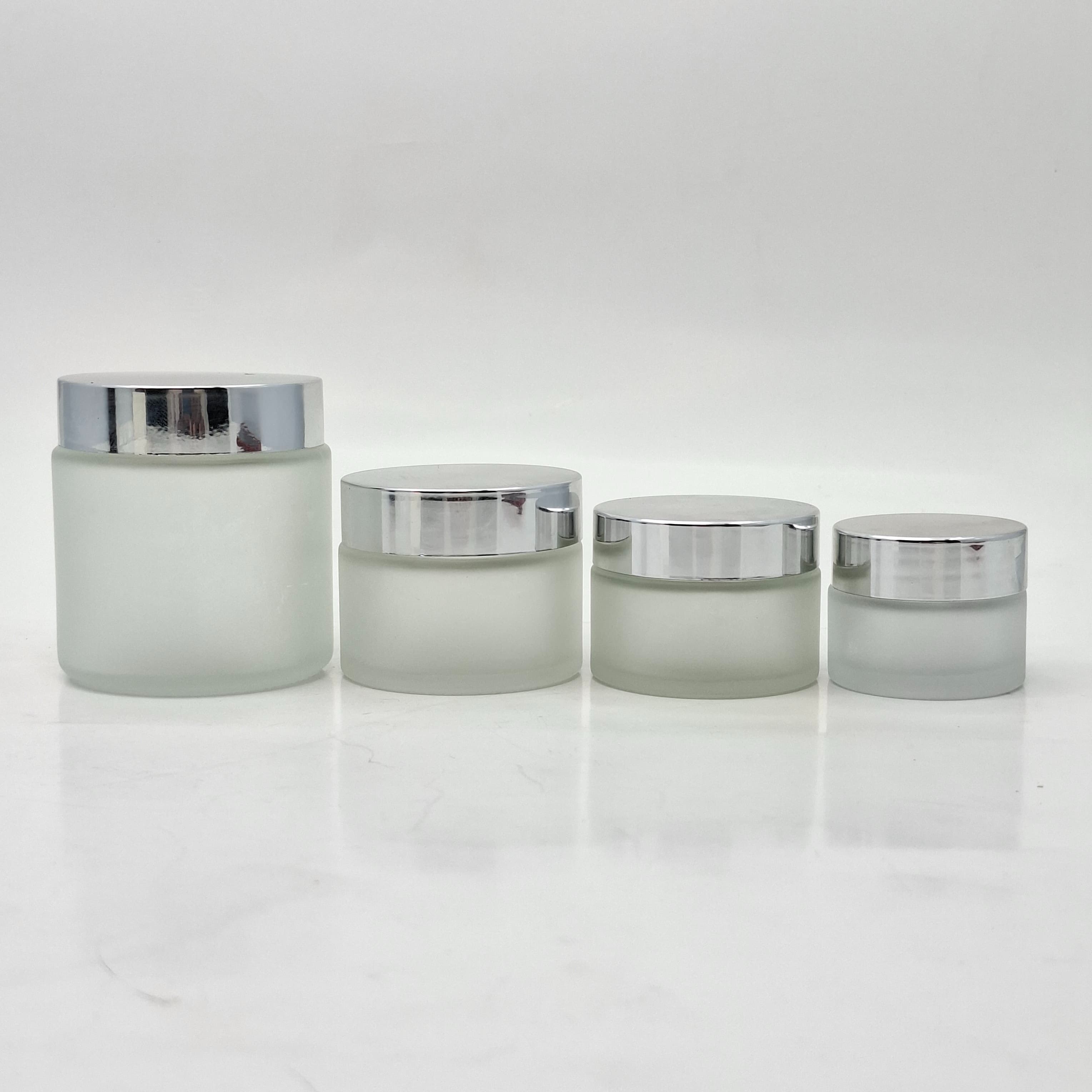 Main image of Frosted Glass Jar - Silver Lid