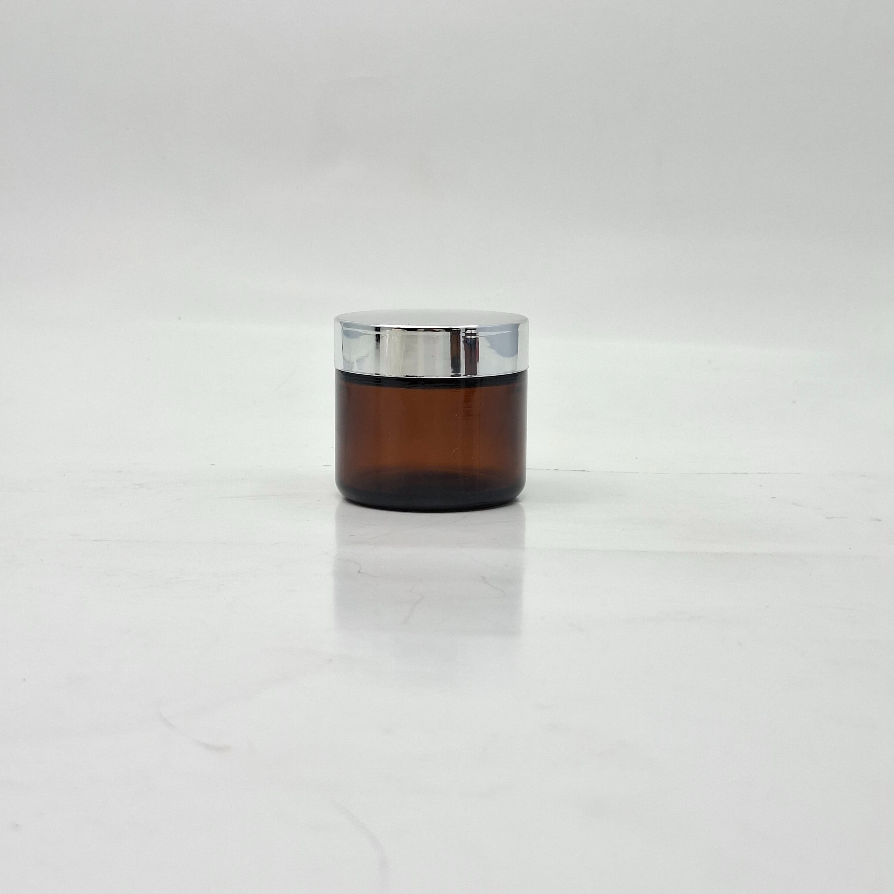 Main image of 60ml Amber Glass Jar - Silver LId 
