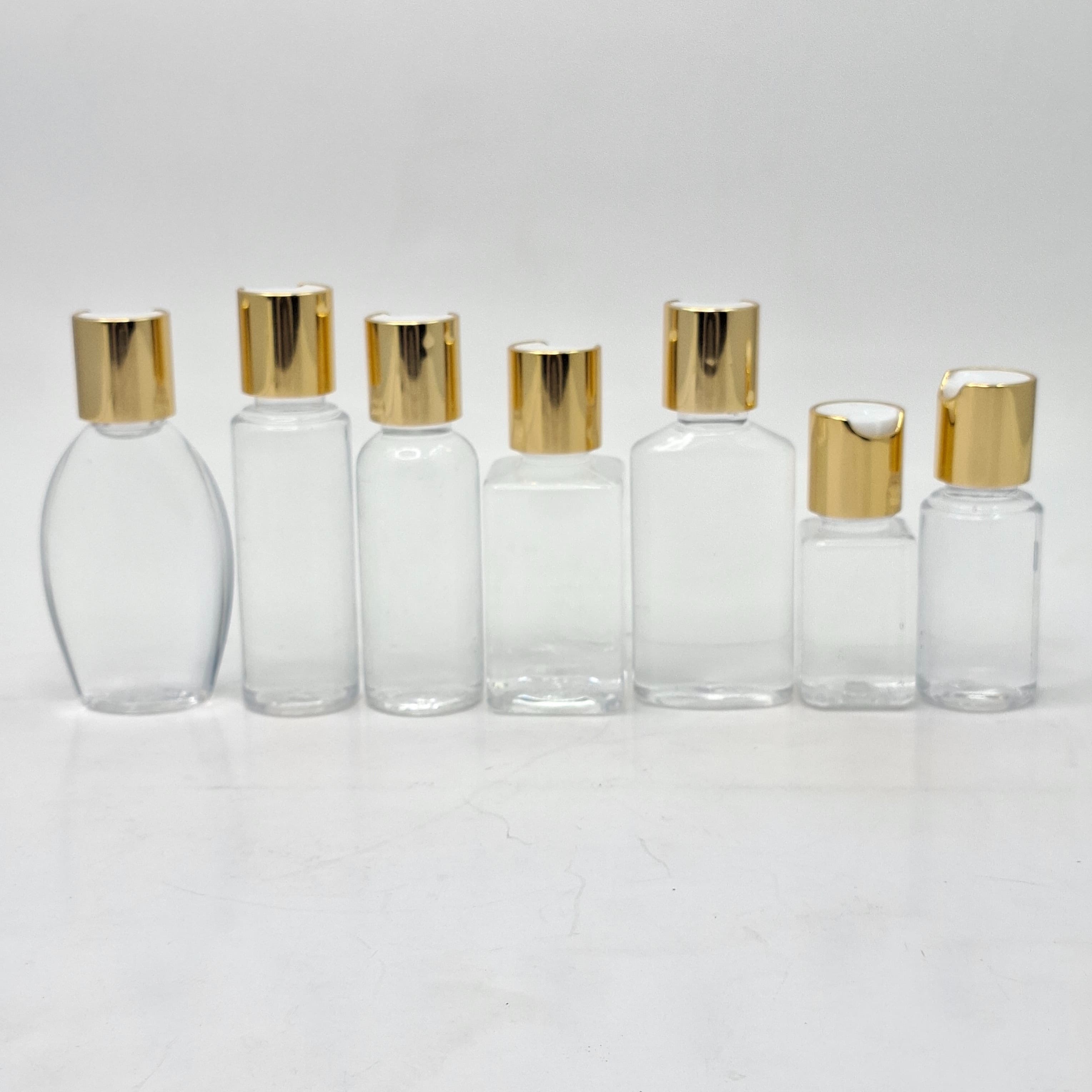 Thumbnail 2 of 30ml Round Bottle Clear - Press Lid Gold 