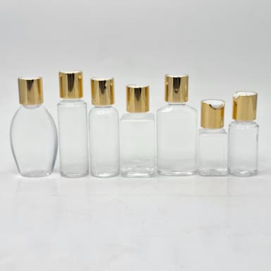 Clear Bottle -Press Cap Gold