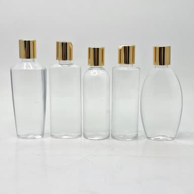 Clear Bottle - Press Cap Gold