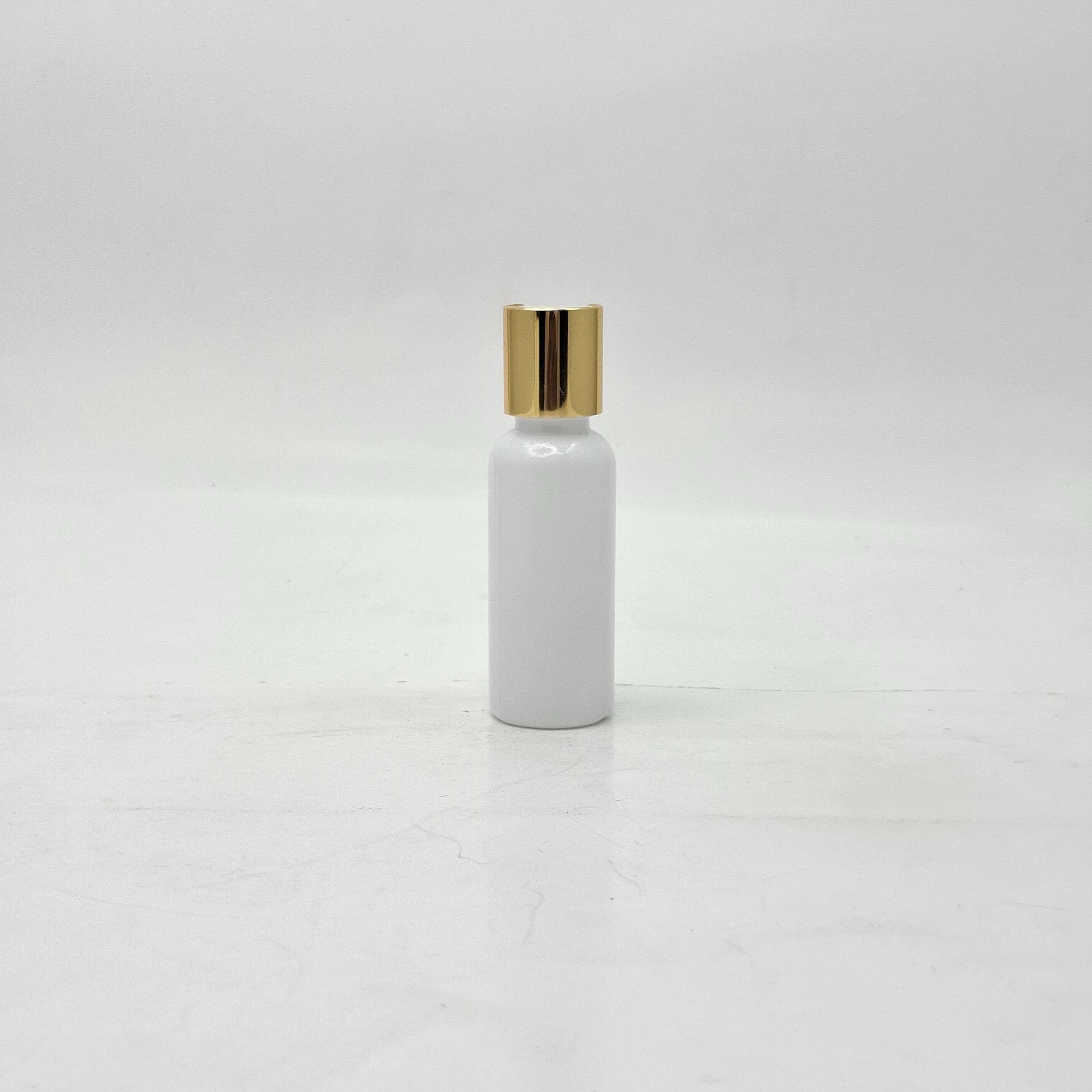 Main image of 40ml Round Milk White Bottle - Press Lid Gold