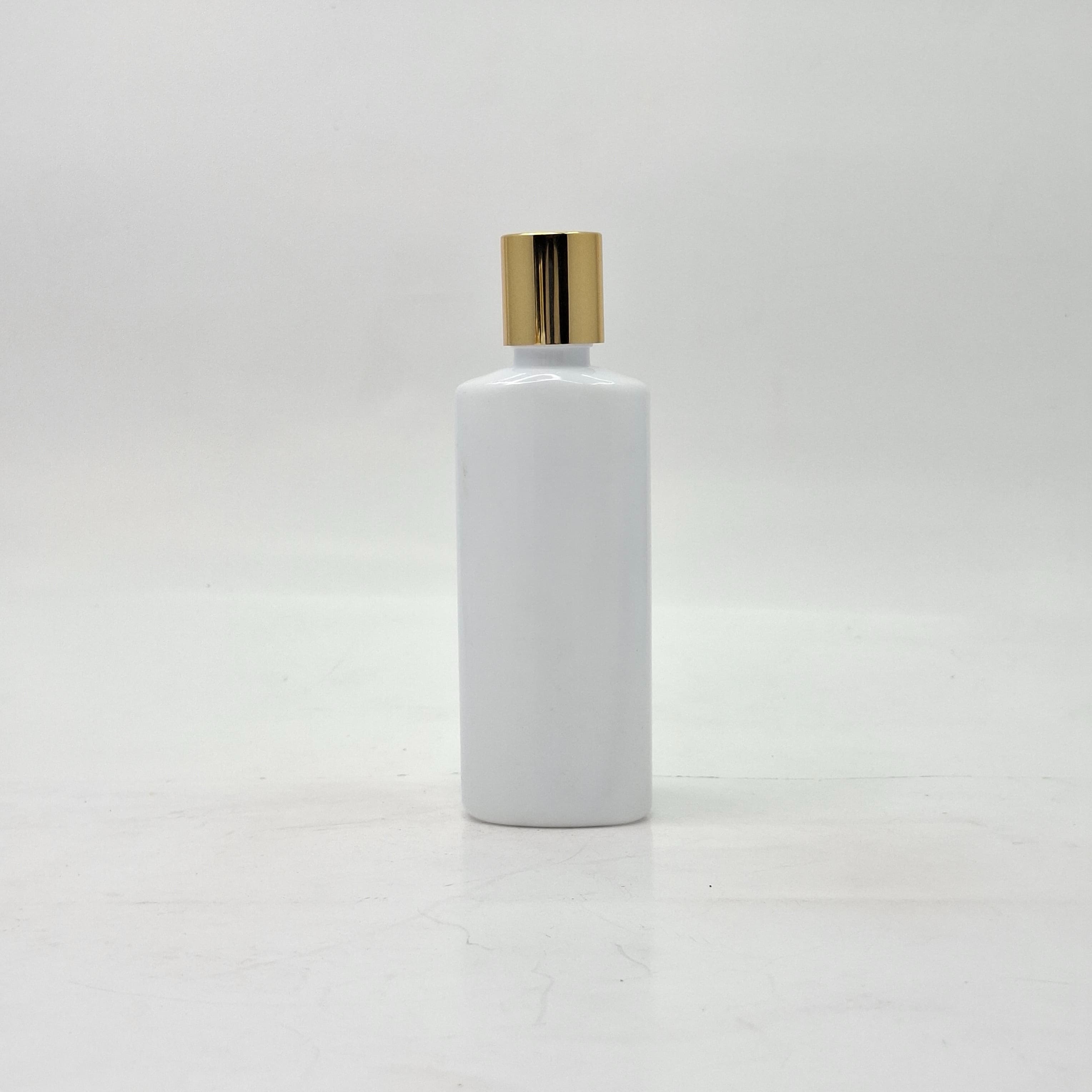 Main image of 100ml Oval Bottle White - Press Lid Gold