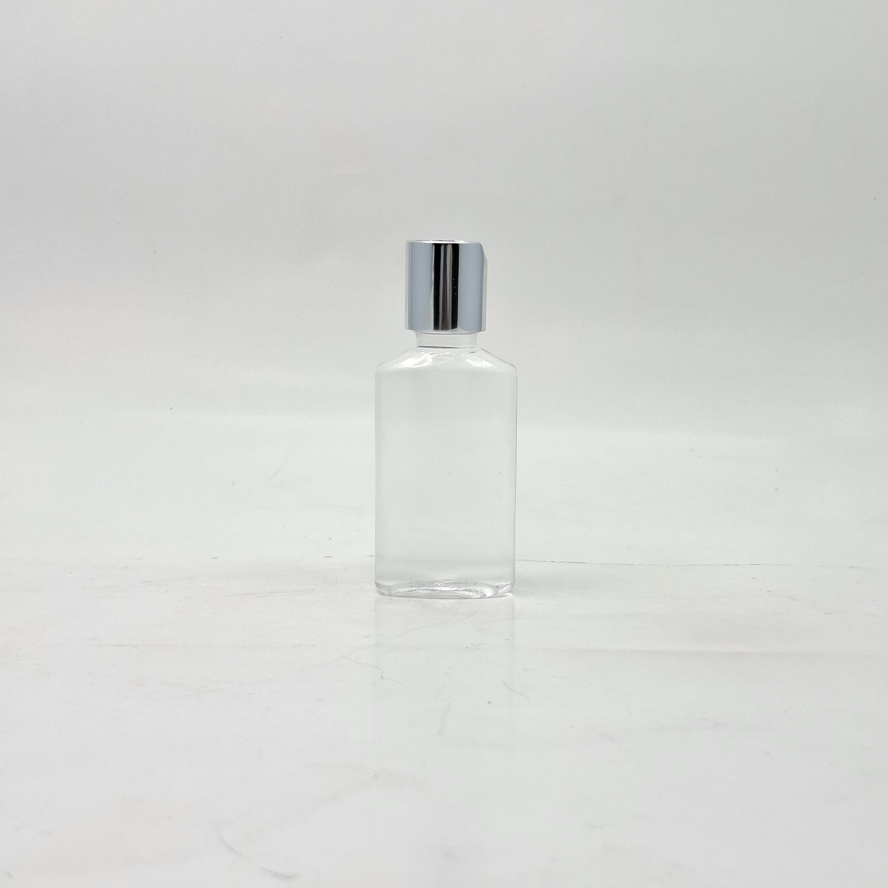Main image of 50ml Oval Bottle Clear - Press Lid Silver
