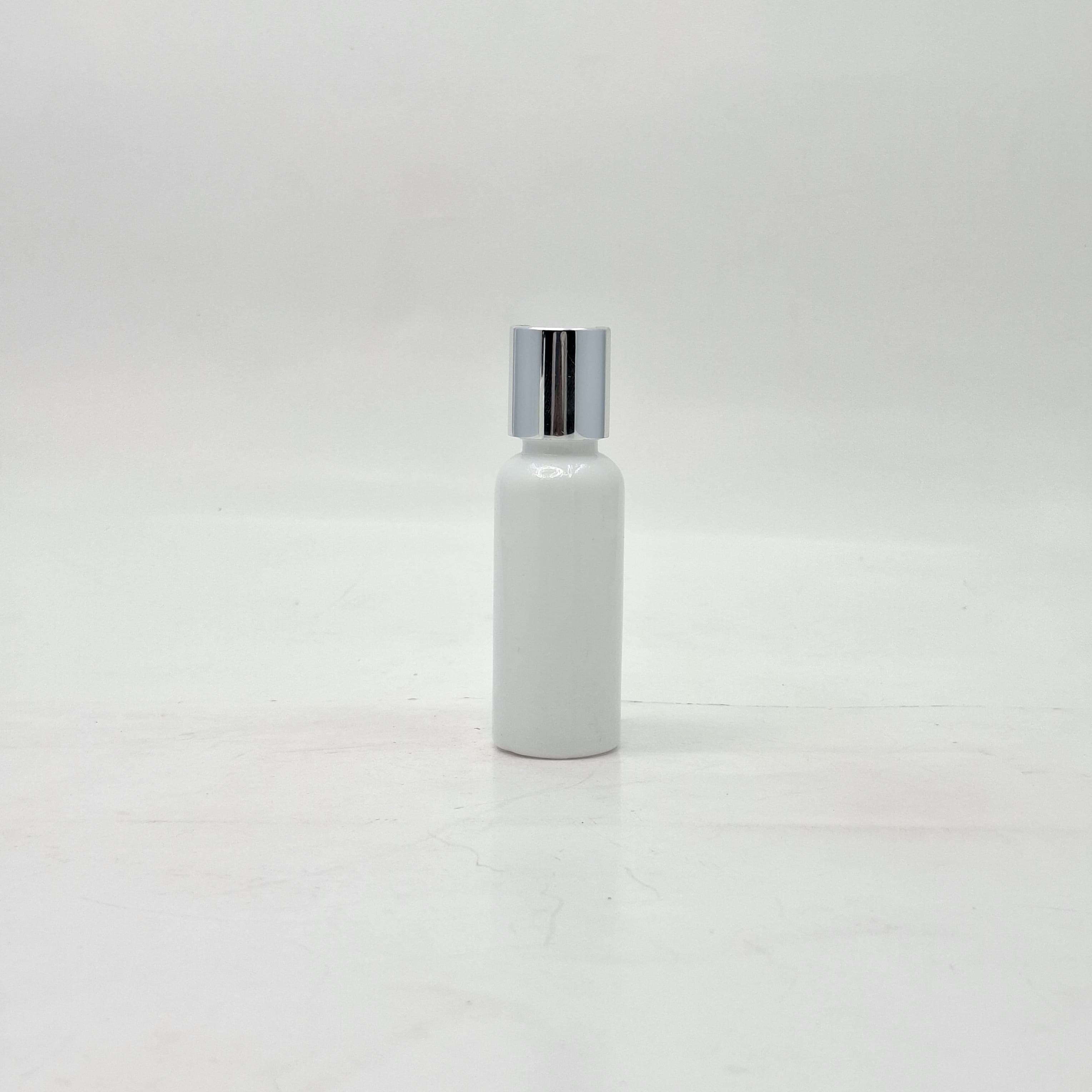 Main image of 40ml Round Bottle White - Press Lid Silver 