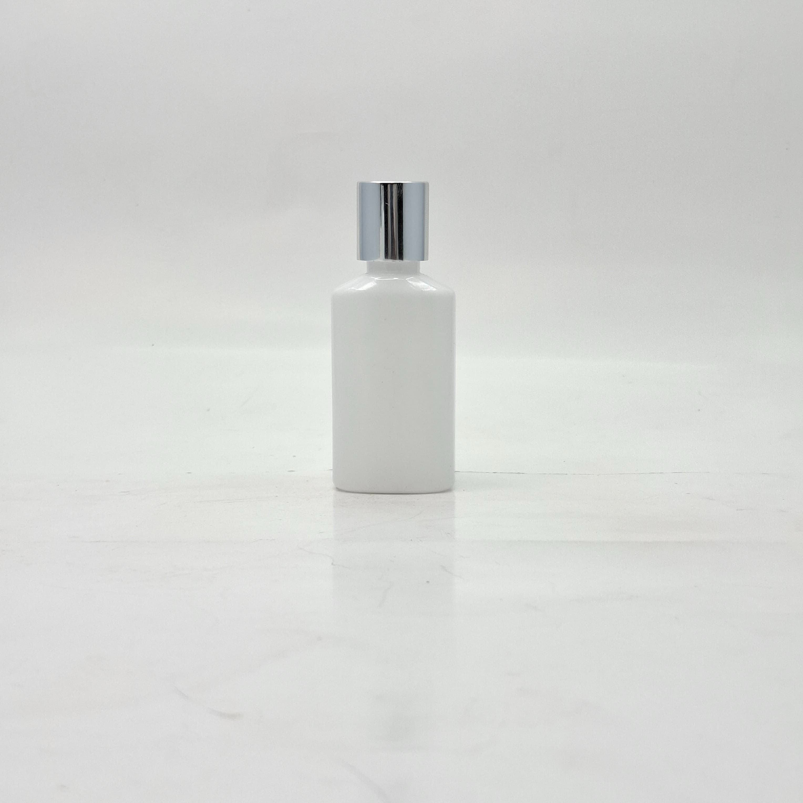 Main image of 50ml Oval Bottle Clear - Press Lid Silver