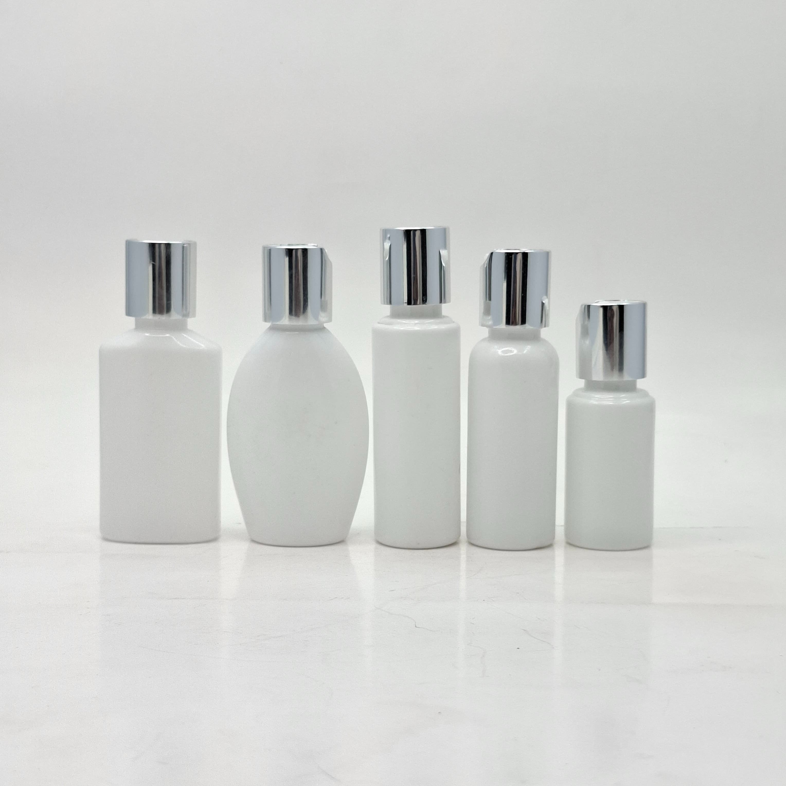 Thumbnail 2 of 50ml Round Flat Neck White Bottle  - Press Lid Silver
