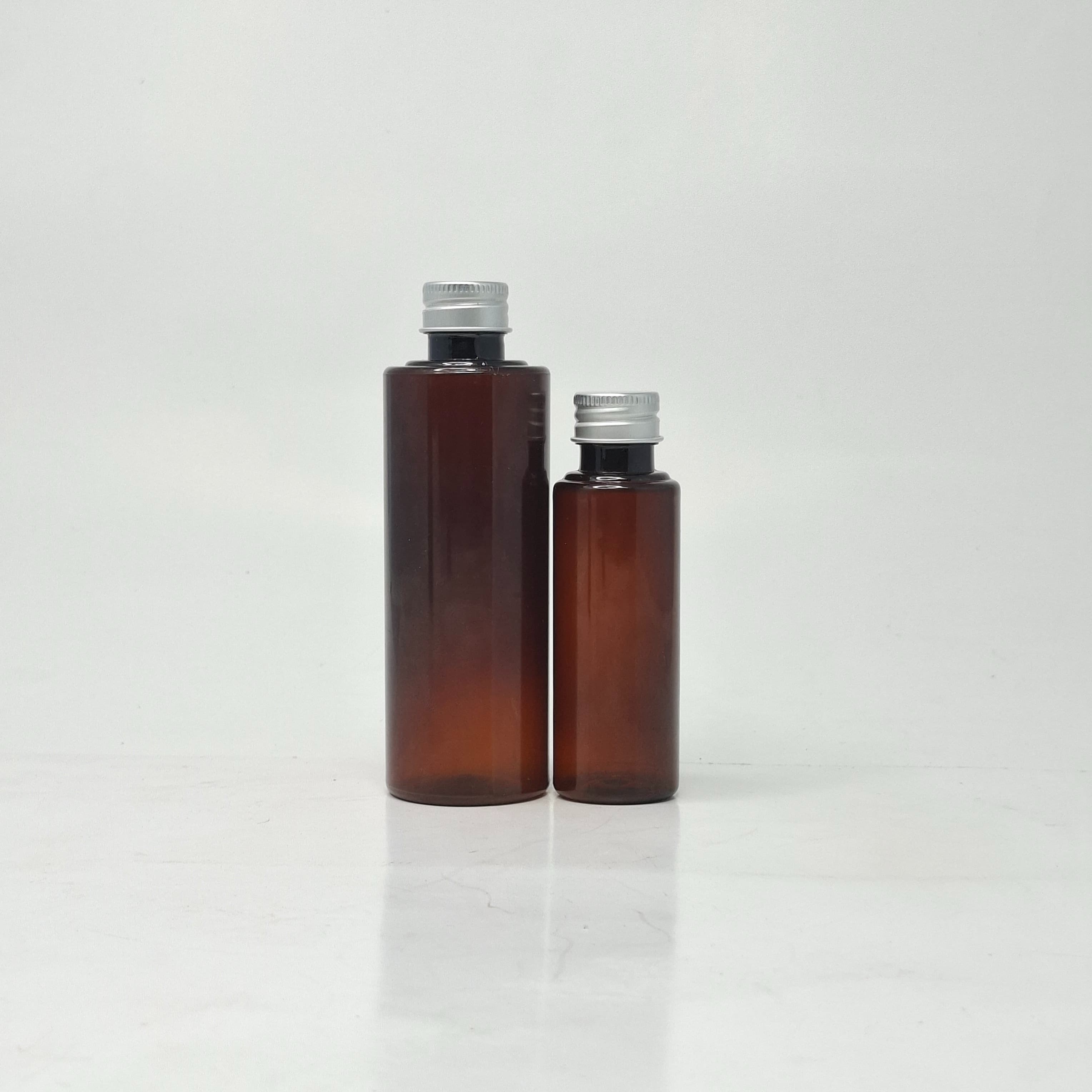 Main image of 50ml-100ml Round Bottle Amber - Alu Cap  Silver