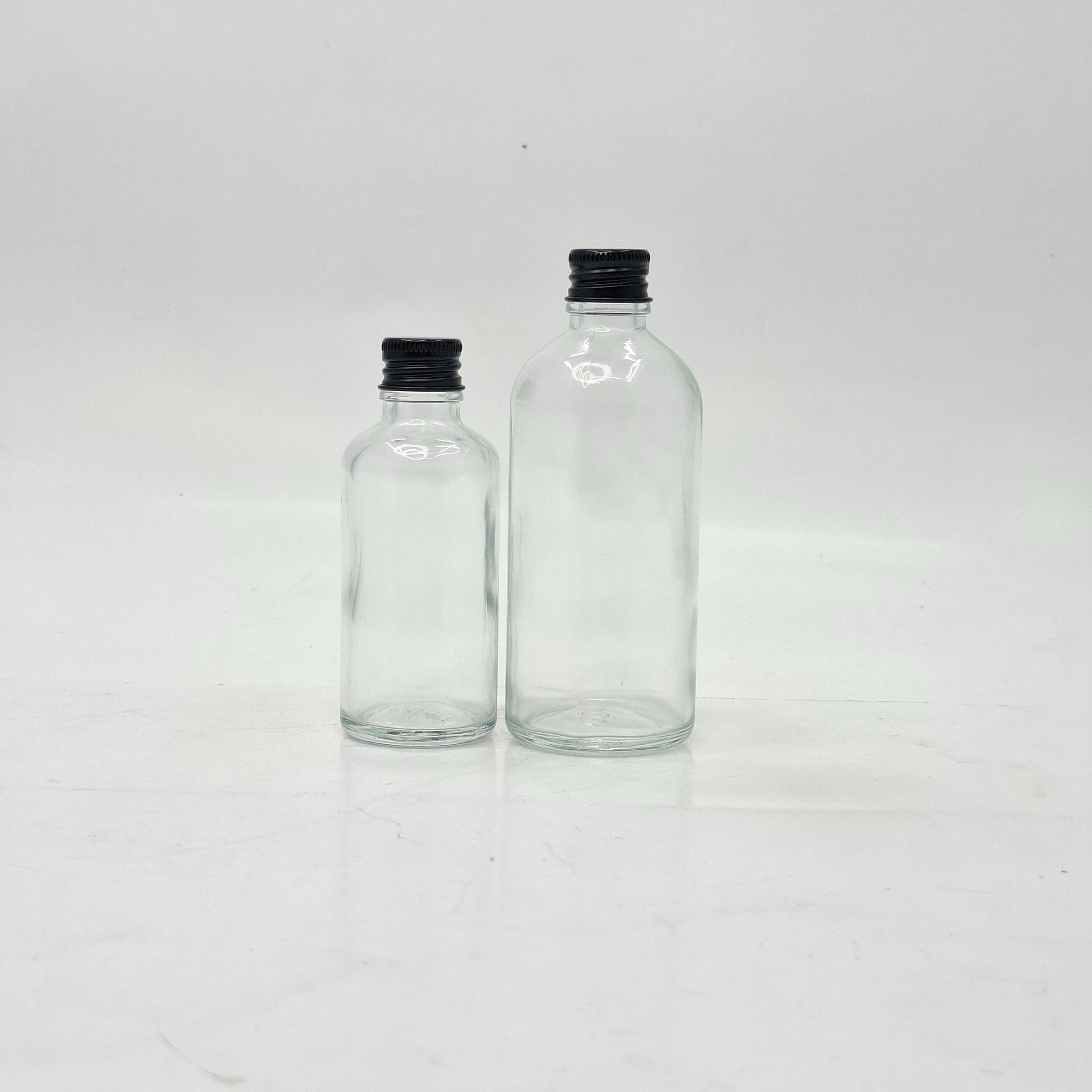 Thumbnail 2 of 50ml Clear Glass Bottle - Alu Cap Black