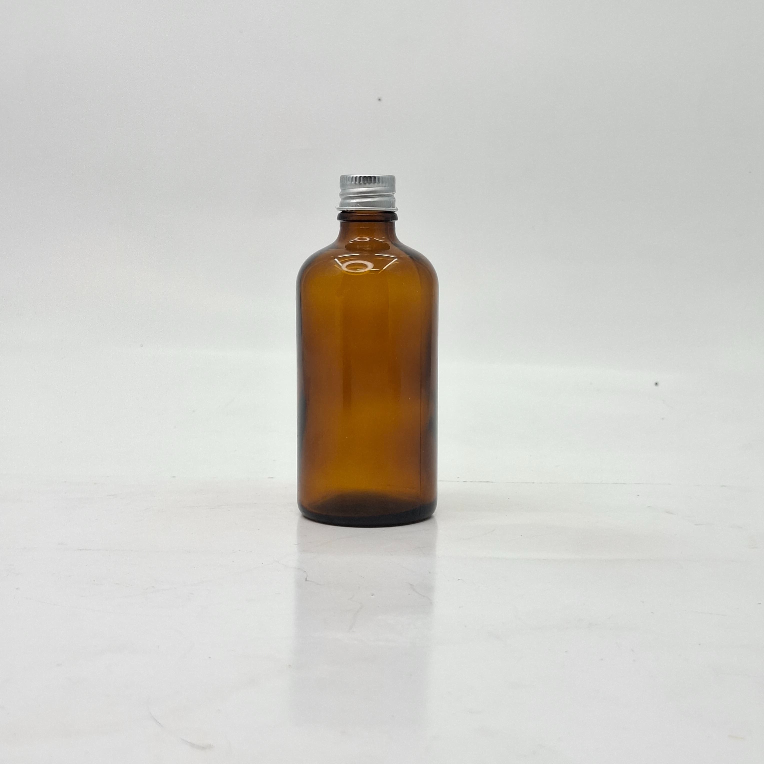 Main image of 100ml Amber Glass Bottle - Alu Cap Silver 