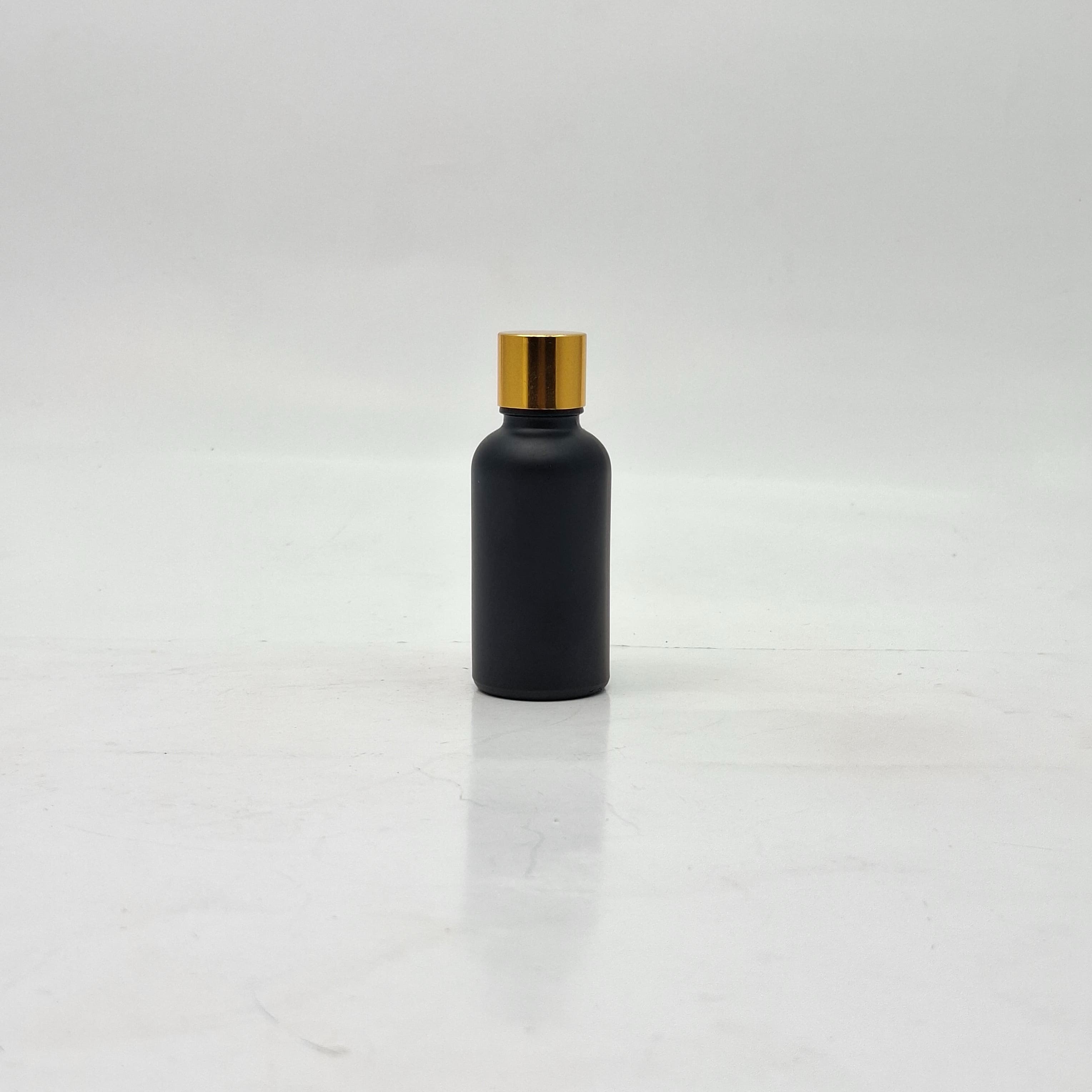 Main image of 30ml Black Glass Bottle -18mm Shine Gold Lid with insert