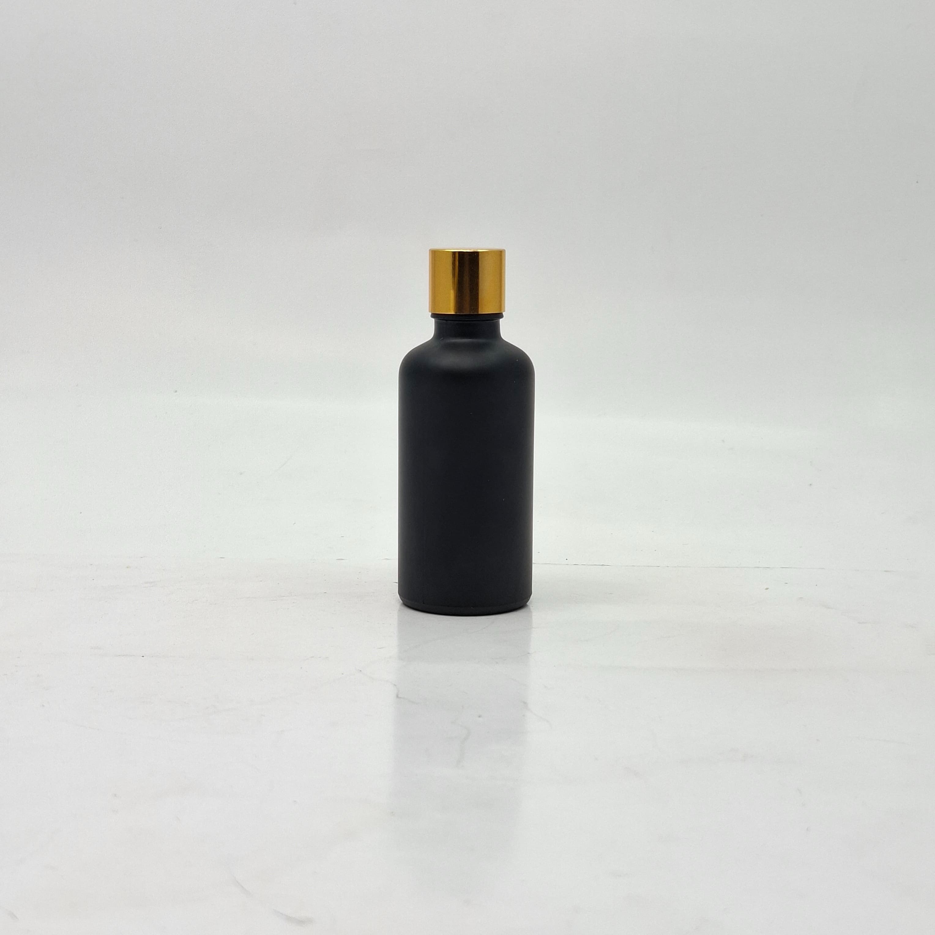 Main image of 50ml Black Glass Bottle -18mm Shine Gold Lid with insert
