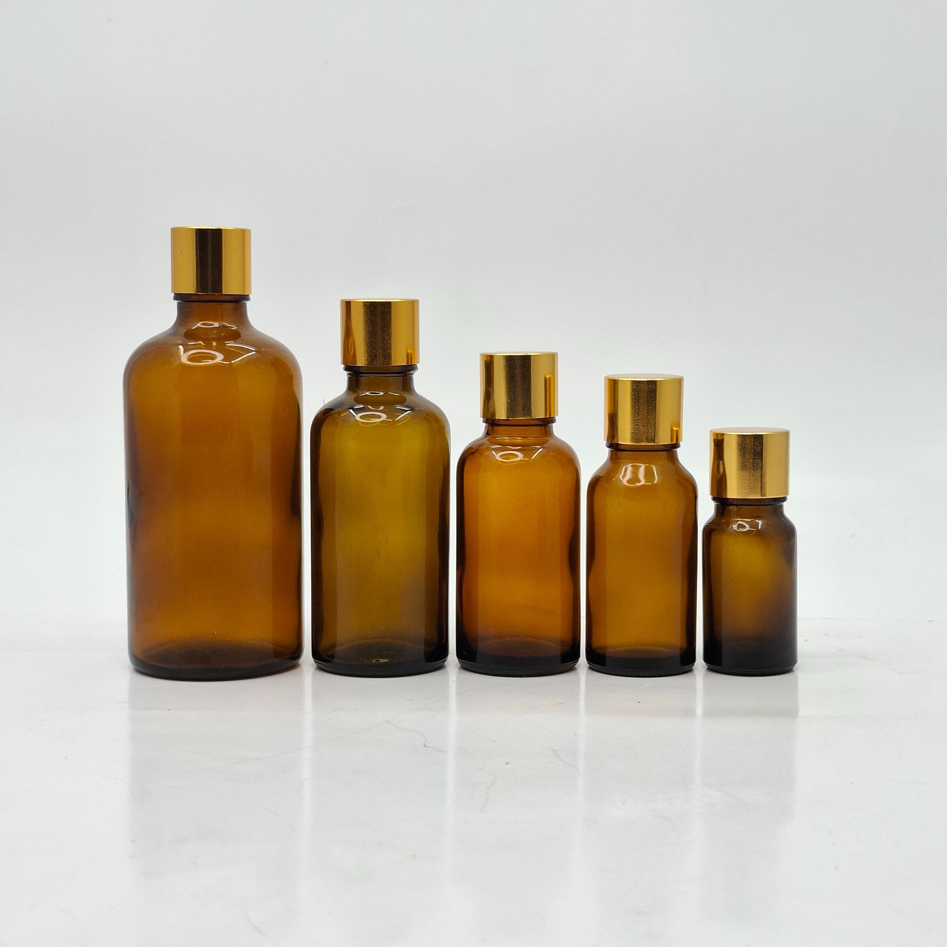 Main image of 10ml-100ml Amber Glass Bottle - Shine Gold Lid