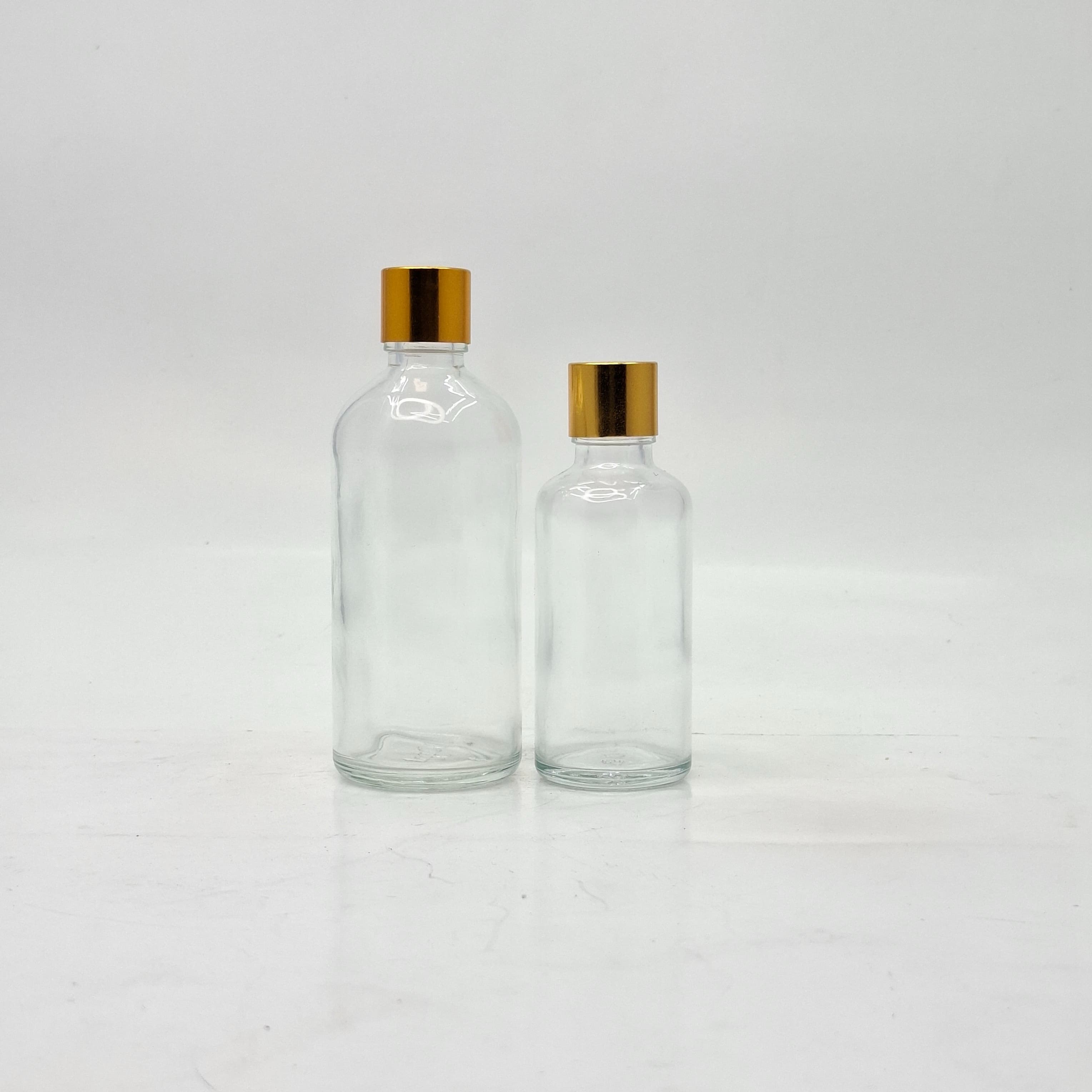 Thumbnail 2 of 100ml Clear Glass Bottle -18mm Shine Gold Lid with insert