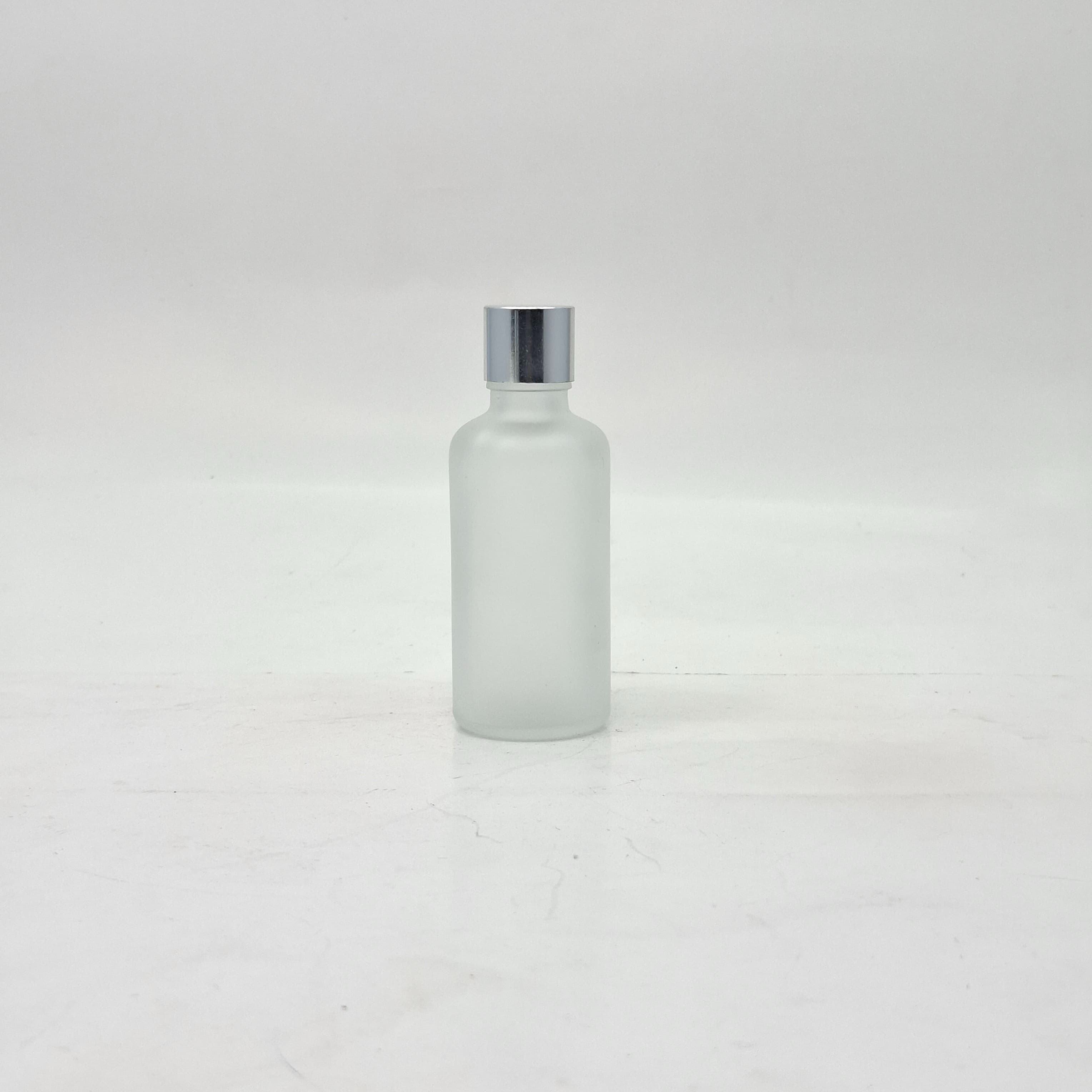 Main image of 50ml Frosted Glass Bottle -18mm Shine Silver Lid with insert