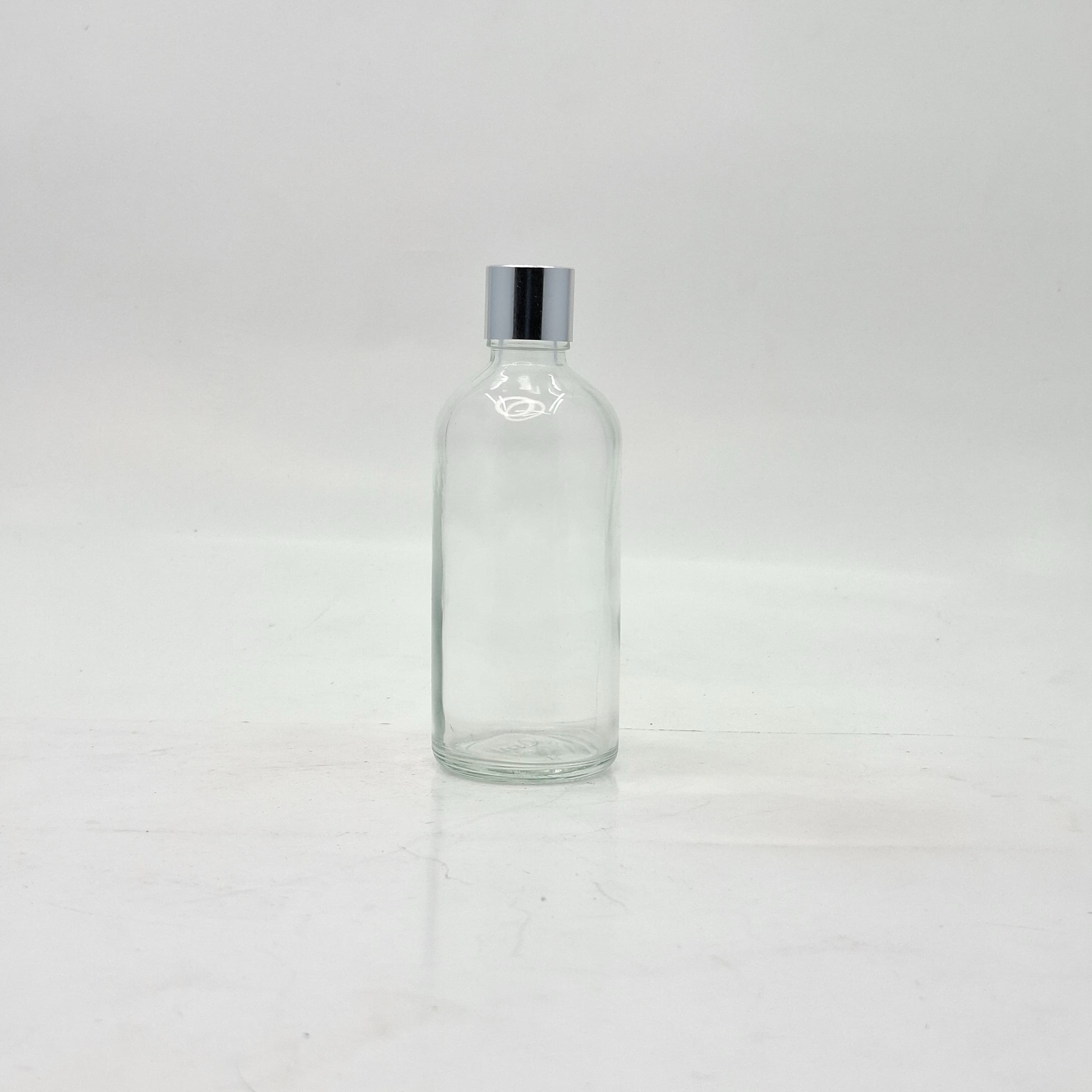 Main image of 100ml Clear Glass Bottle - 18mm Shine Silver Lid with insert