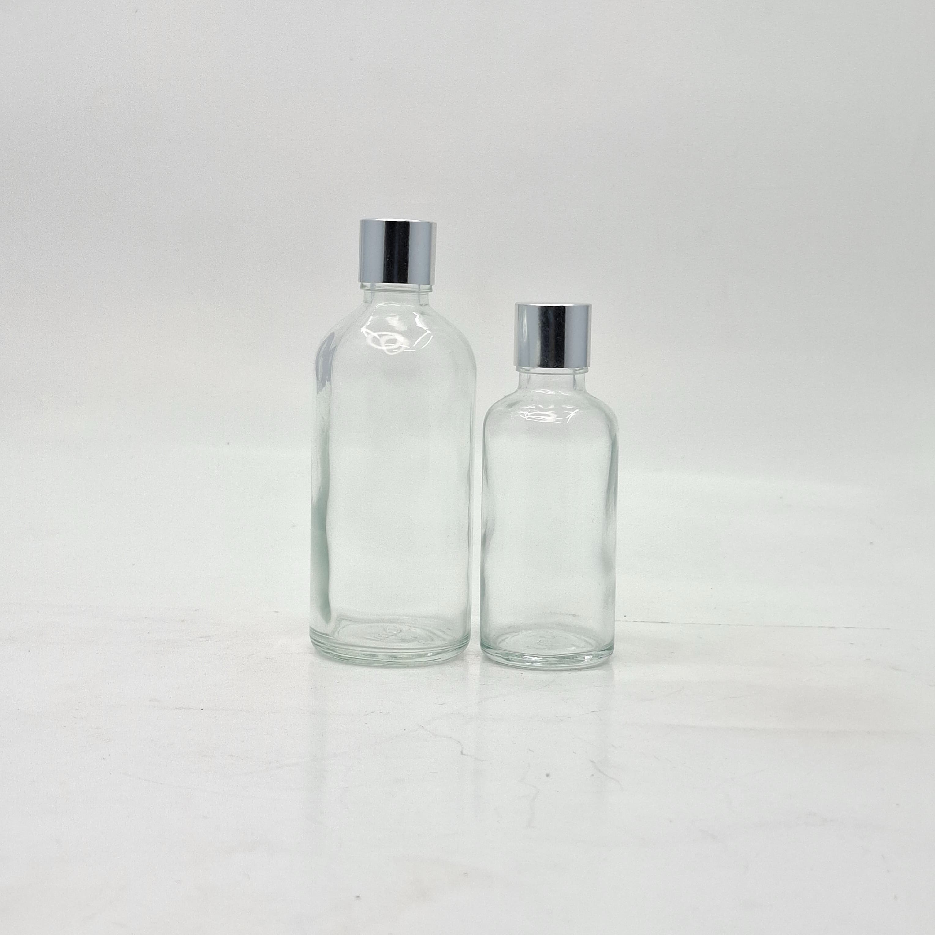 Main image of 50ml-100ml Clear Glass Bottle - Shine Silver Lid