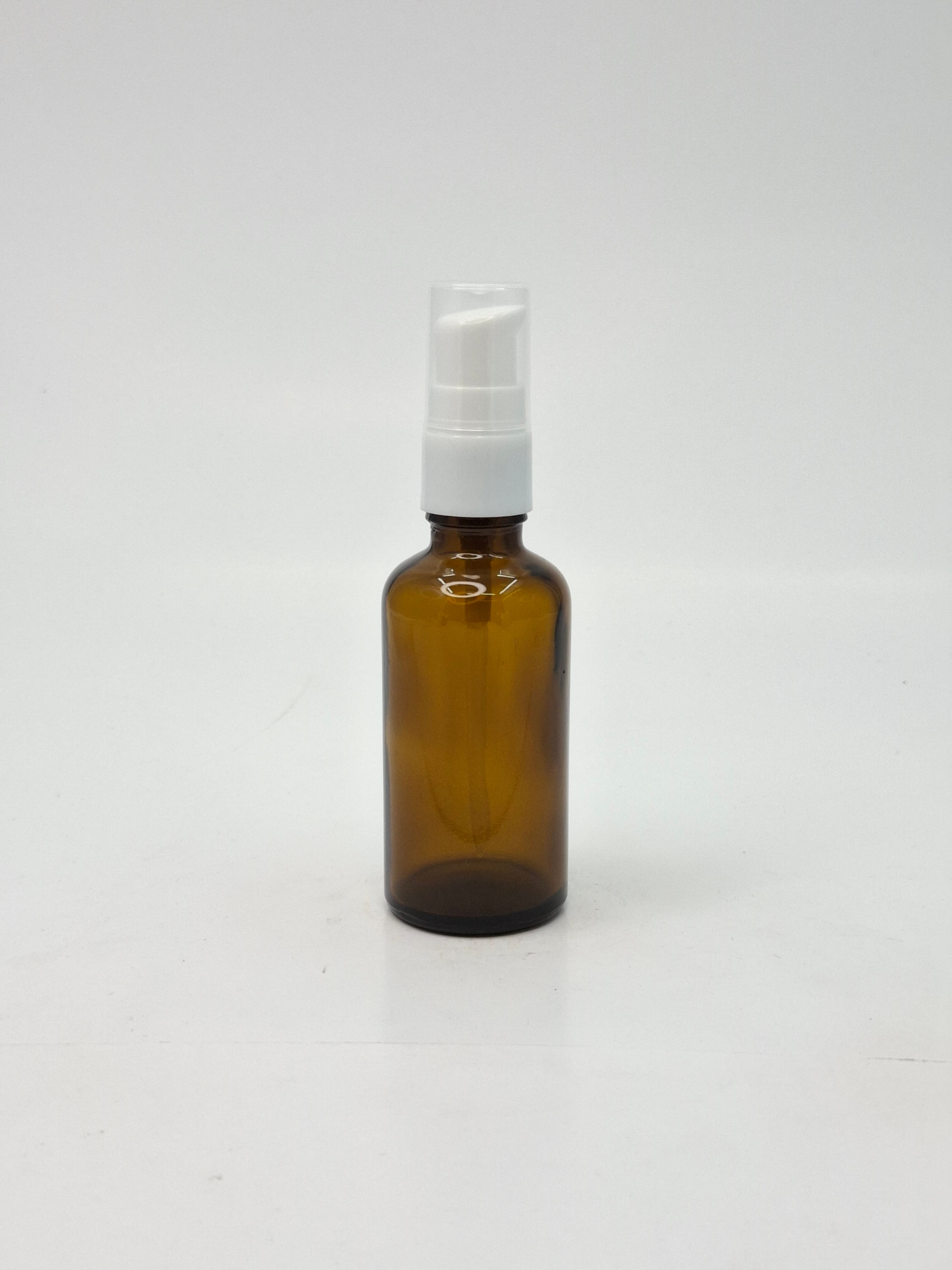 Thumbnail 2 of Amber Bottles with White Cream Pump