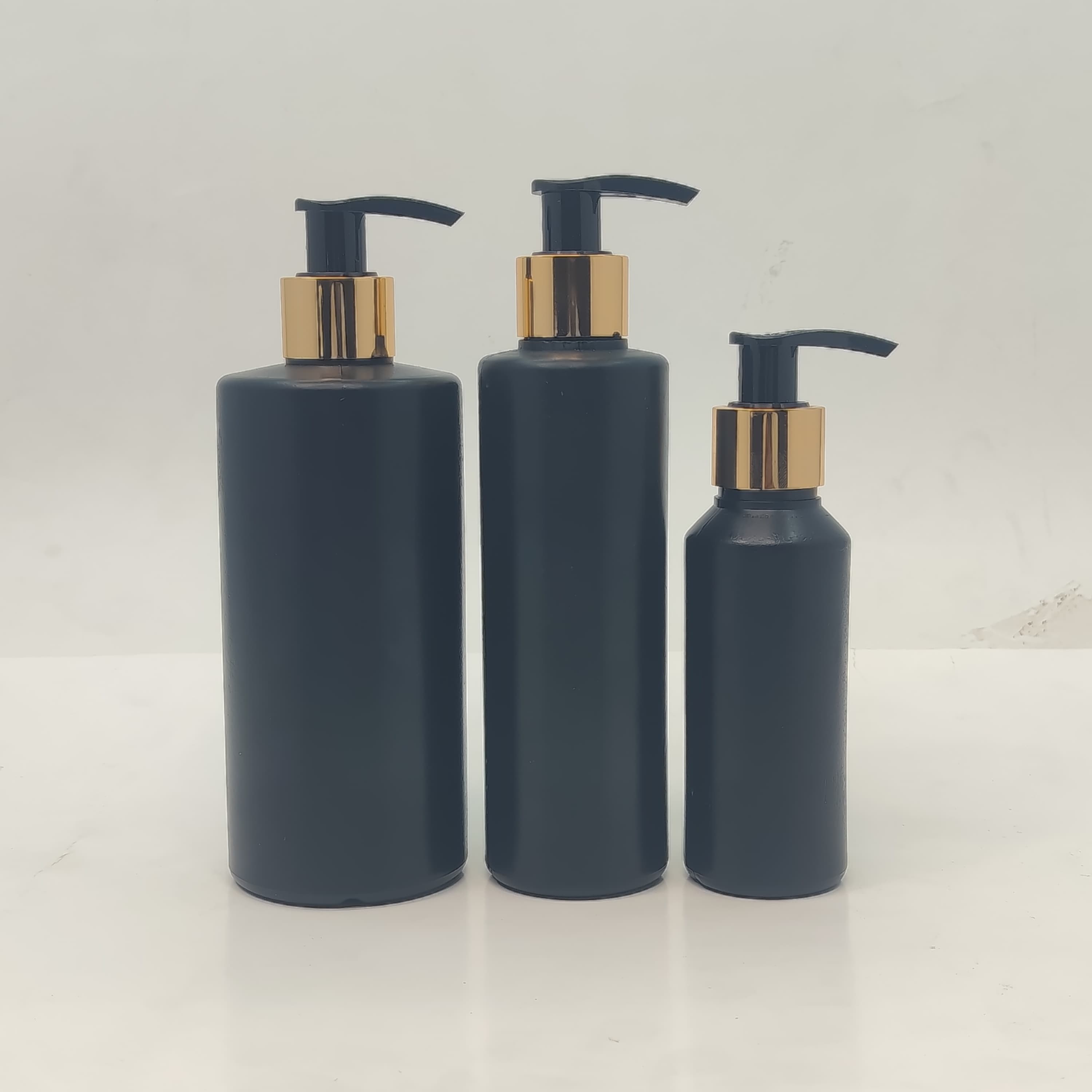 Main image of 100ml-340ml HDPE Black Bottle - Gold Black Pump