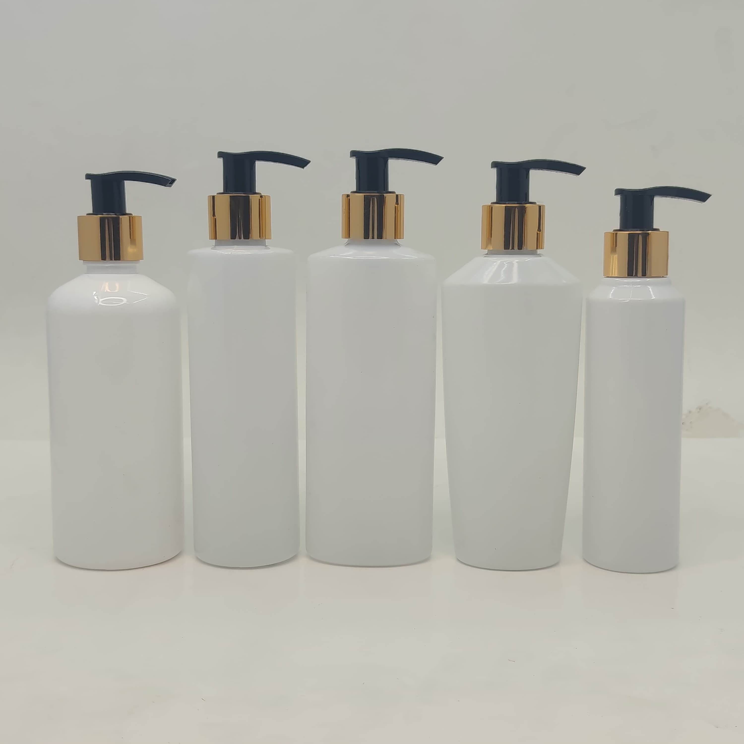 Main image of 150ml-300ml Milk White Bottles - Gold/Black Pump