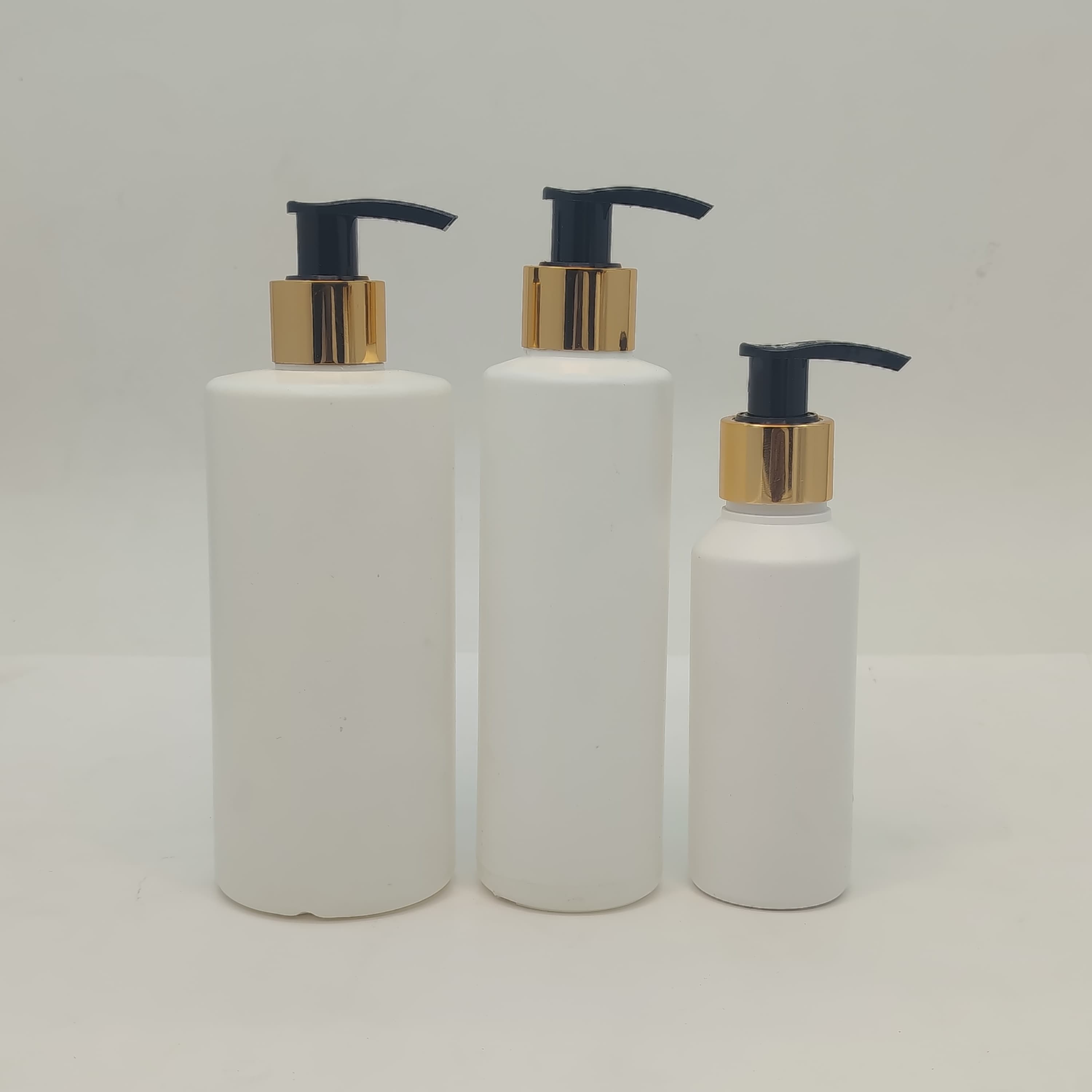 Main image of 100ml-340ml HDPE White Bottle-Gold Black Pump