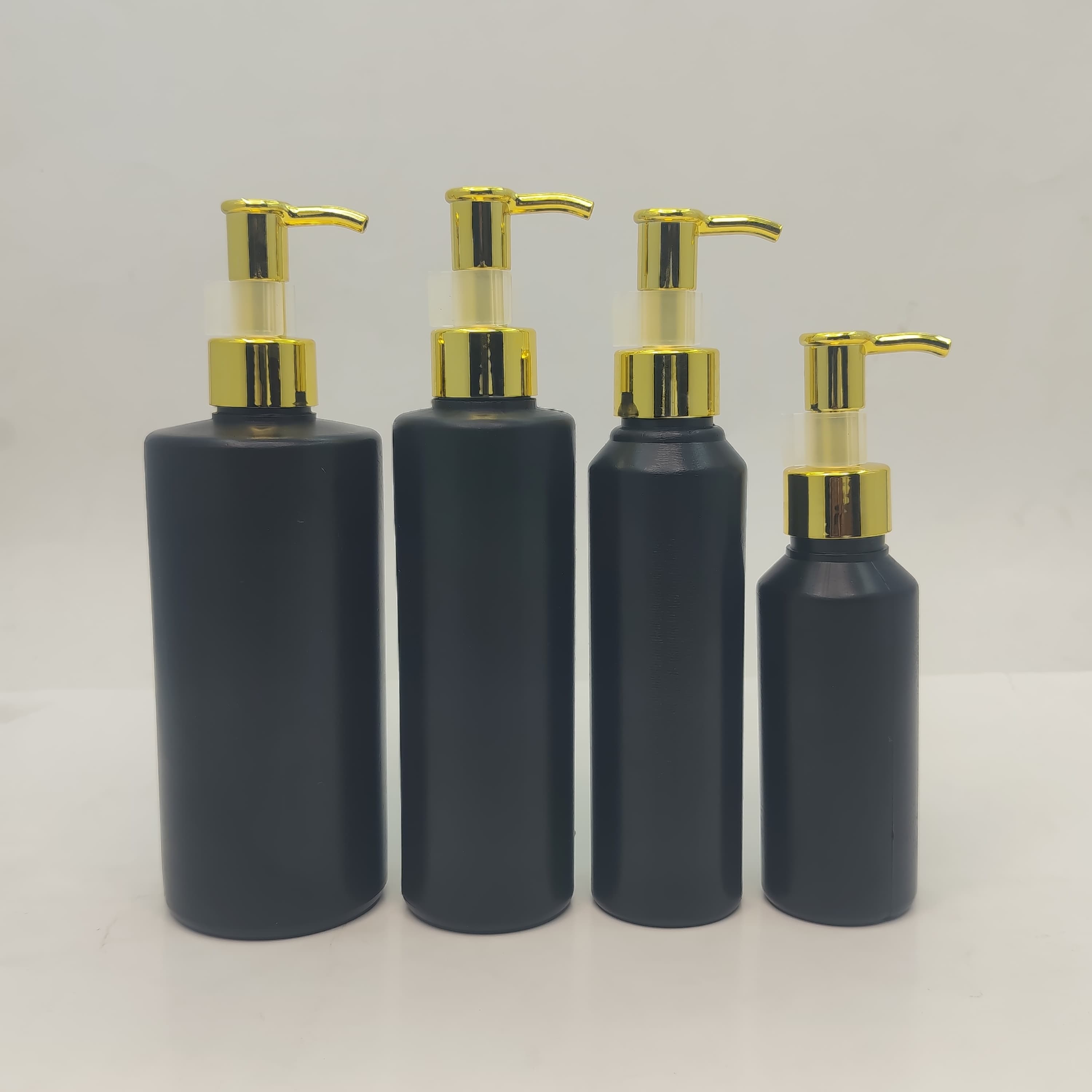Main image of 100ml-340ml HDPE Black Bottle - Gold Pump-Long Neck