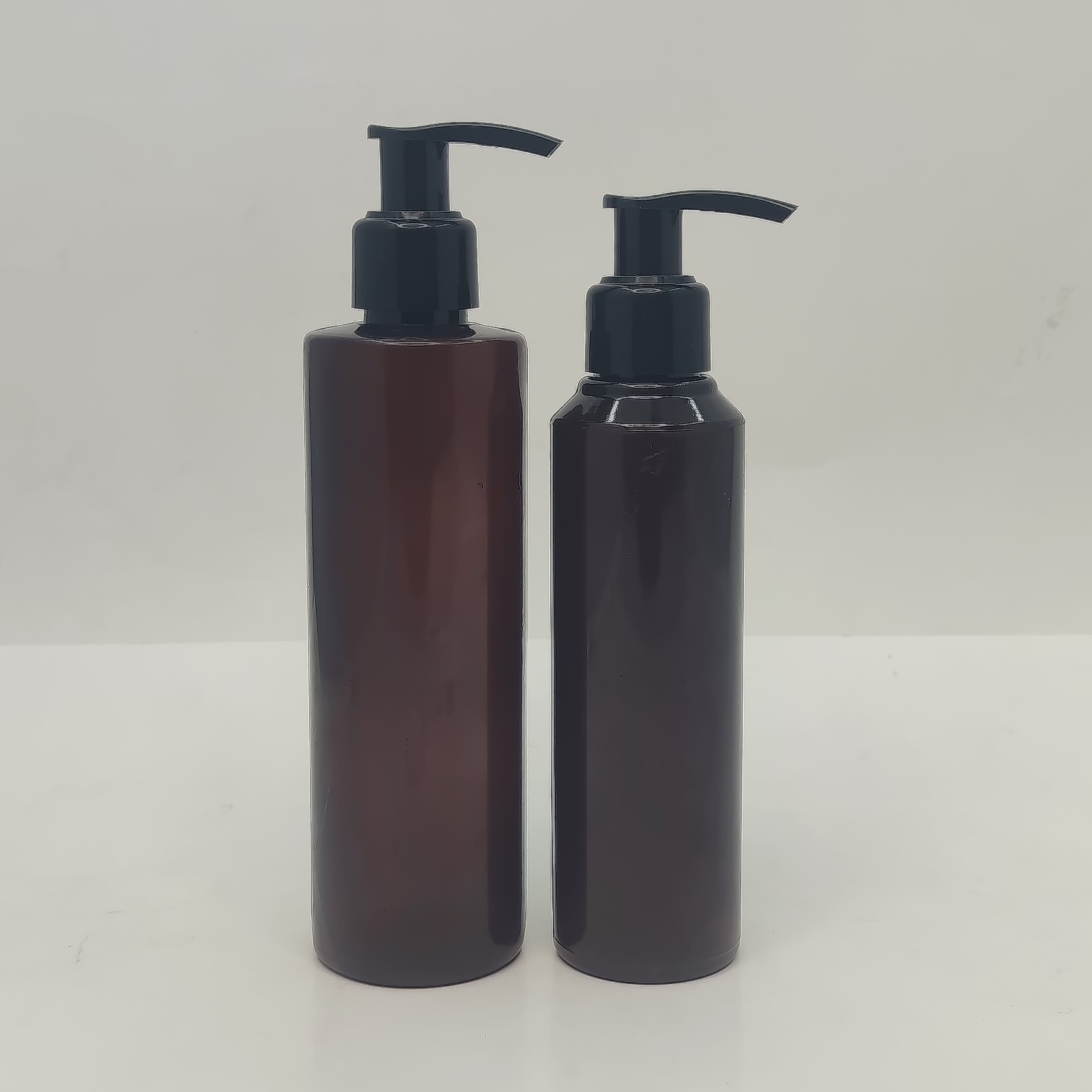 Main image of 150ml-200ml Round Amber Bottle - Black Pump
