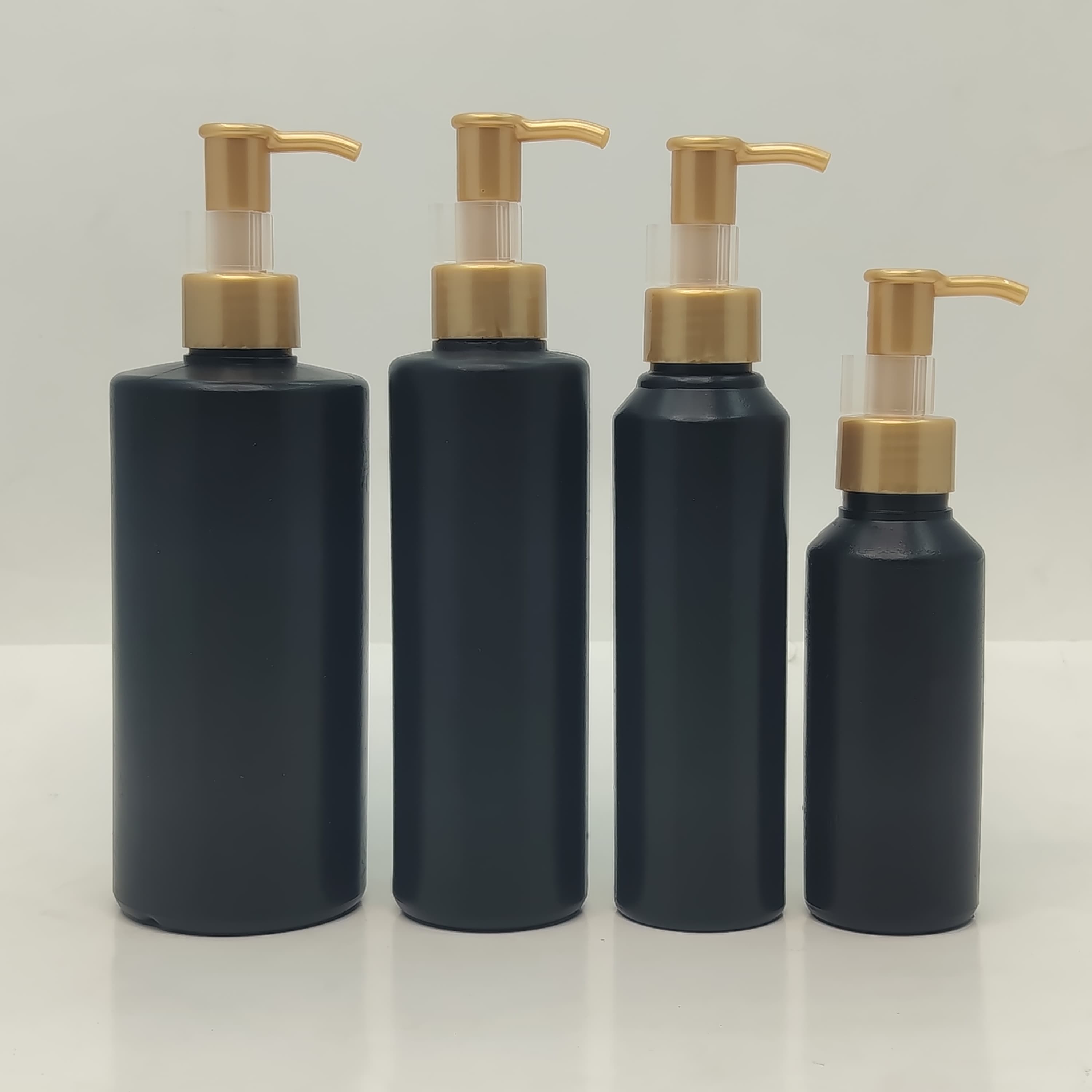 Main image of 100ml-340ml HDPE Black Bottle - Gold Cream Pump-Long Neck