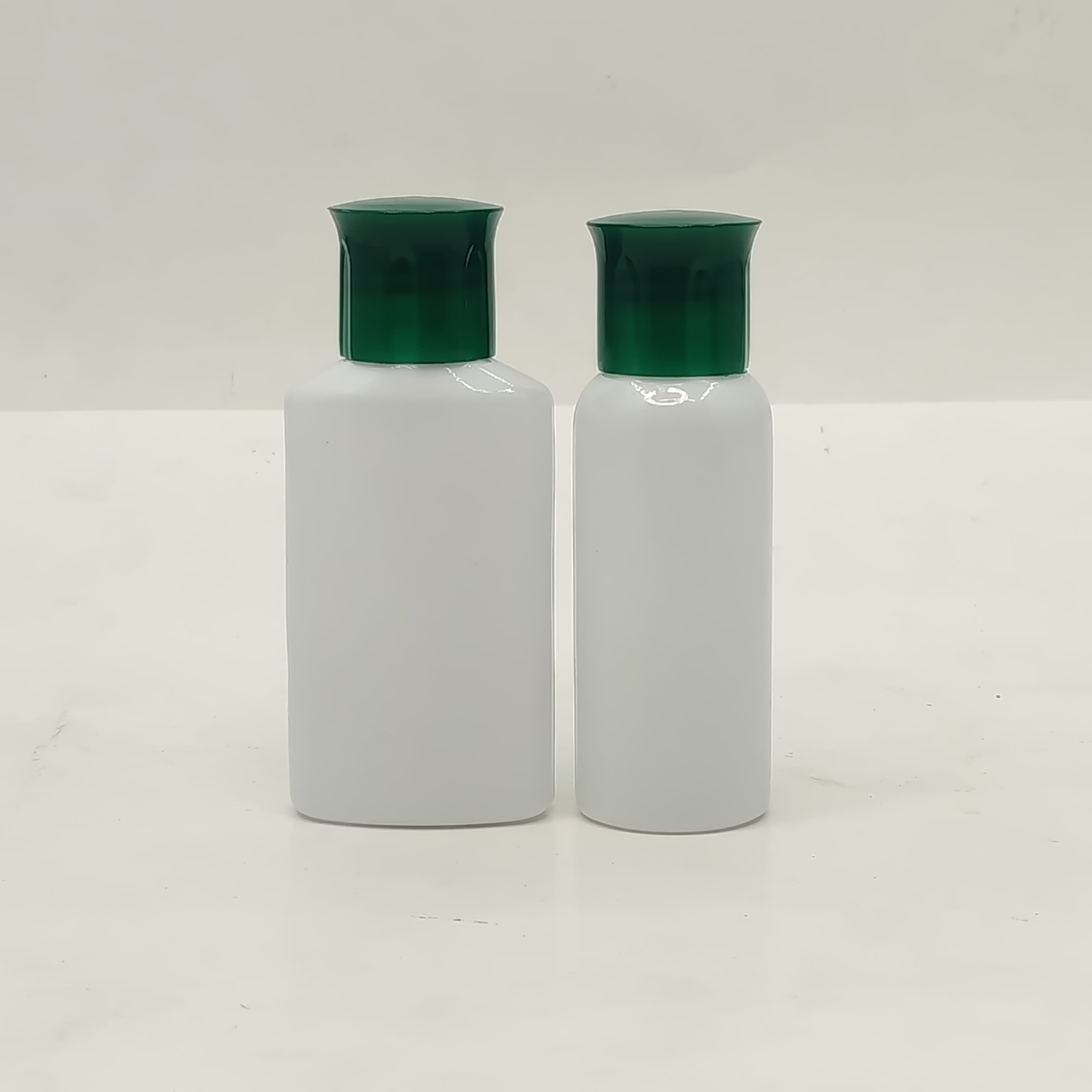 Main image of 40ml-50ml Milk White Bottle - Oil Lid Green