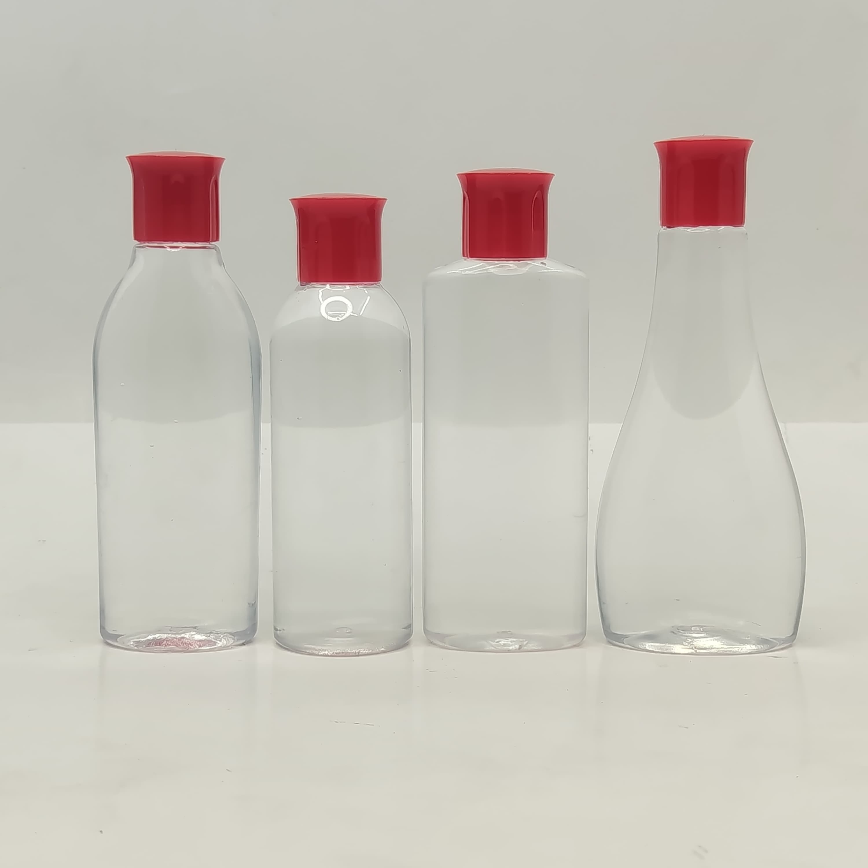Main image of 100ml Clear Bottle - Oil Lid Red