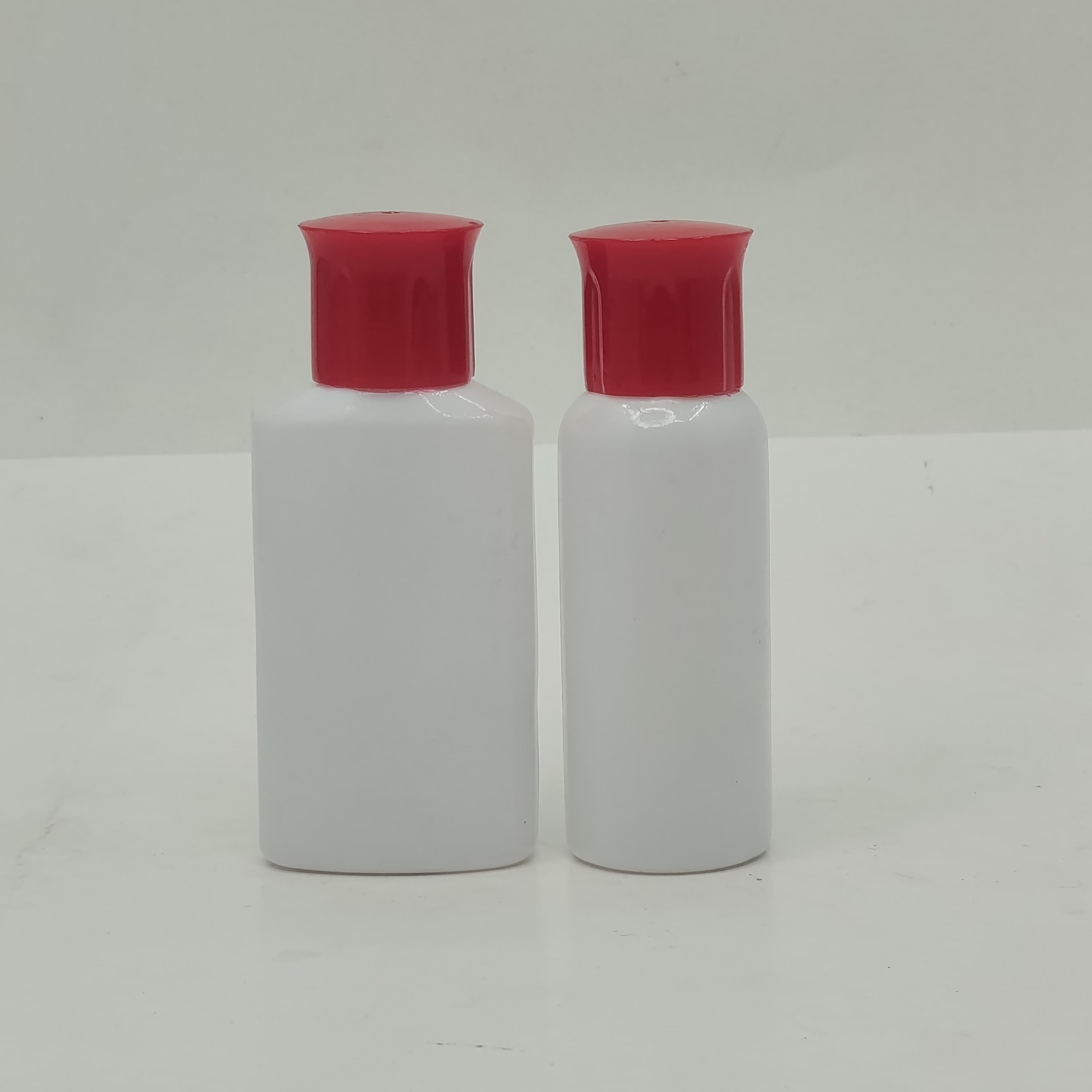 Main image of 40ml-50ml Milk White Bottle - Oil Lid Red