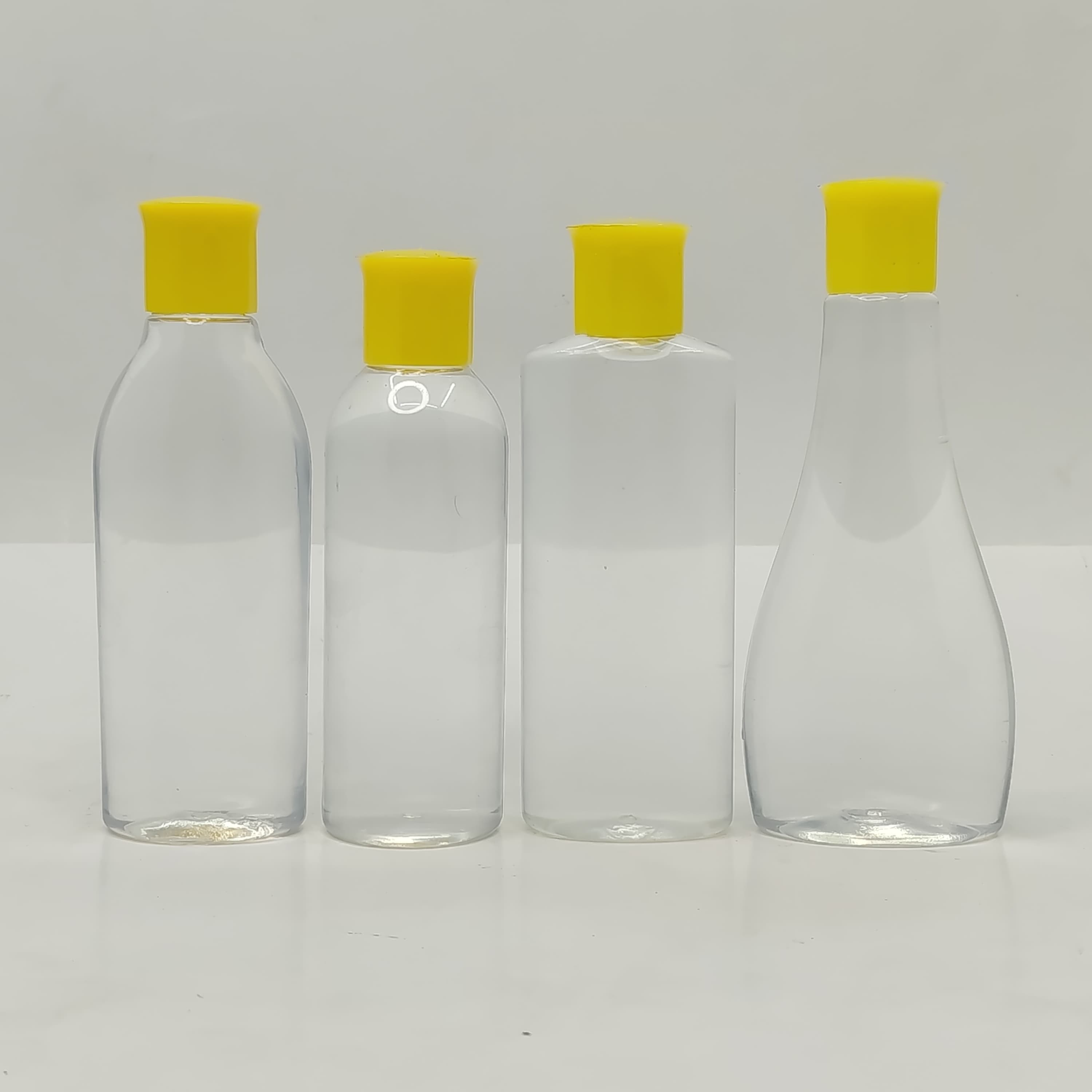 Main image of 100ml Clear Bottle - Oil Lid Yellow