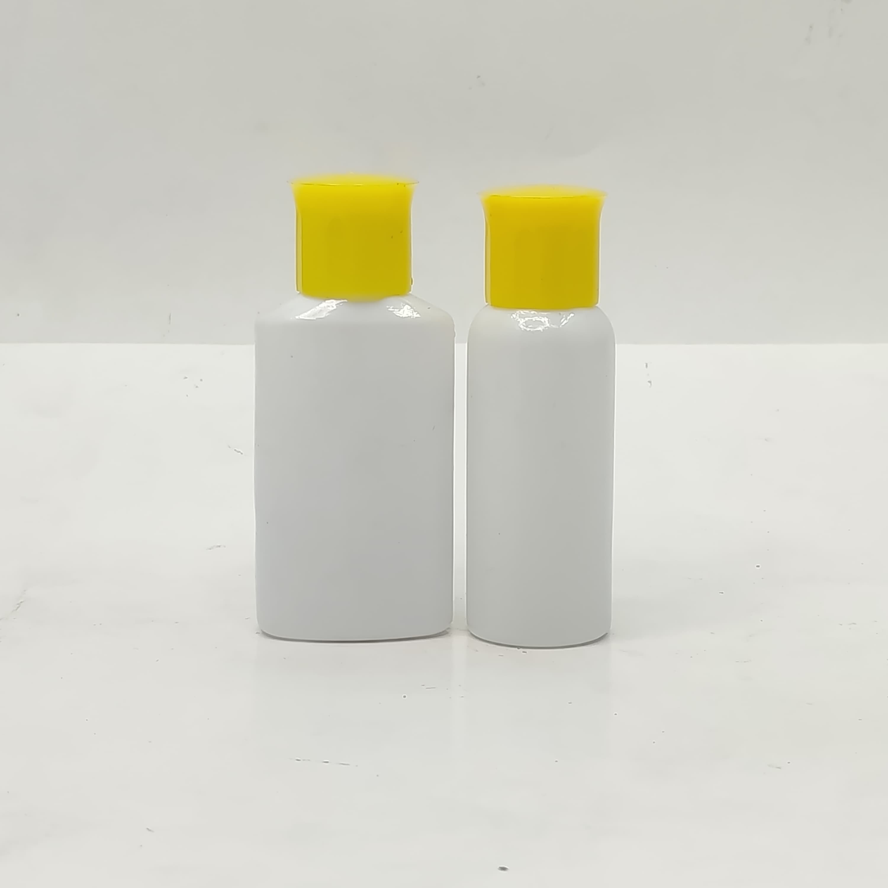 Main image of 40ml-50ml Milk White Bottle - Oil Lid Yellow