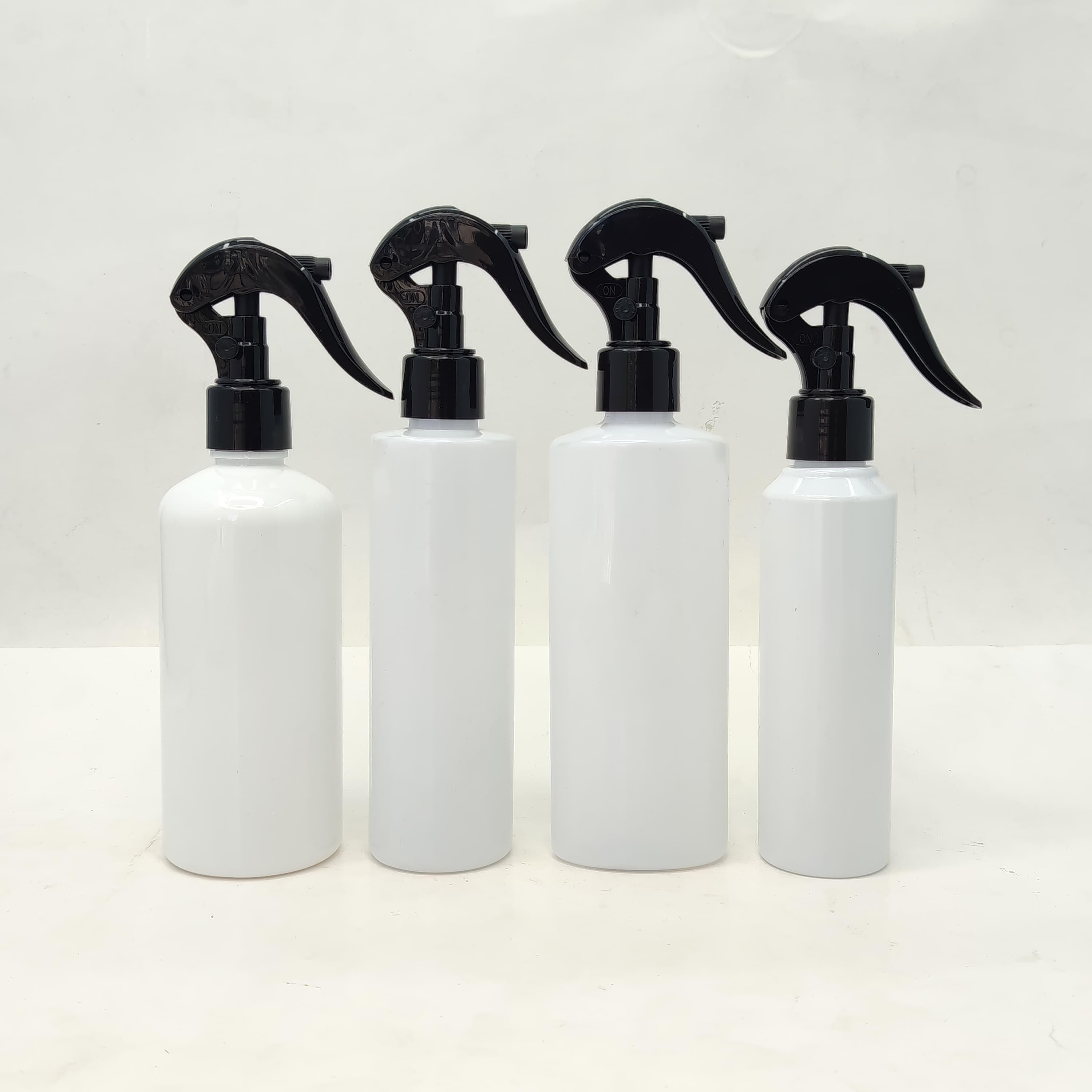 Main image of Mini Trigger Black - Milk White Bottle