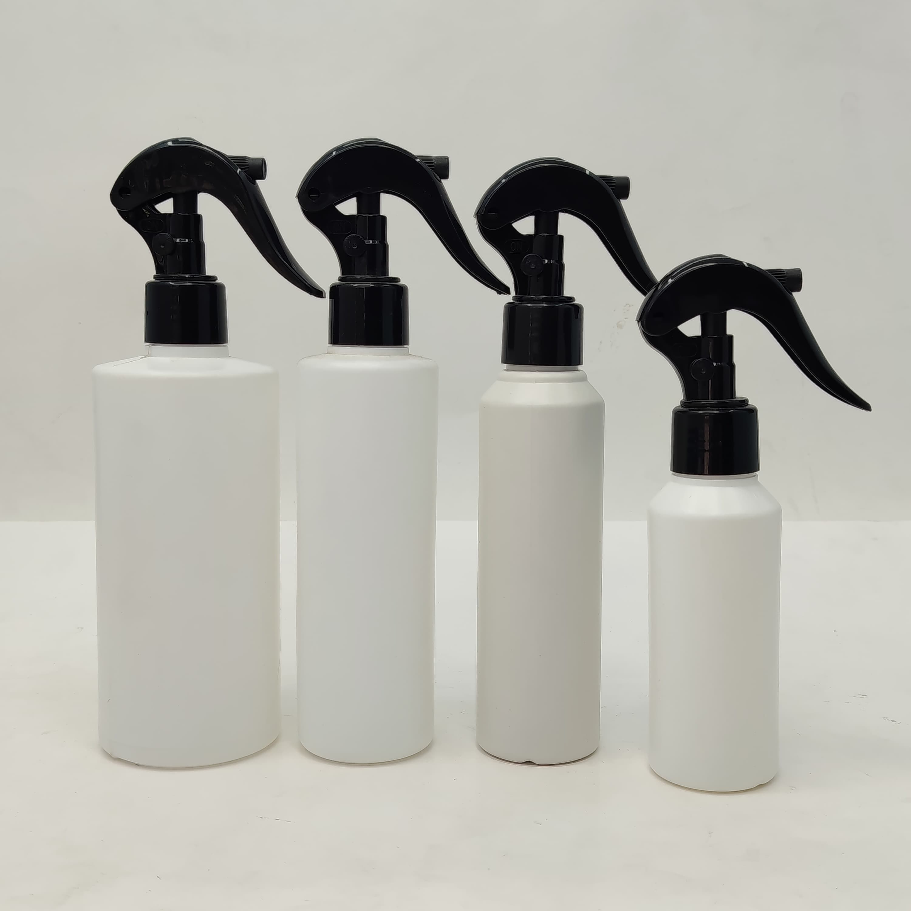 Main image of Mini Trigger Black - HDPE White Bottle