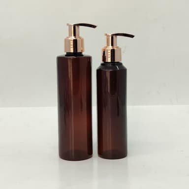 150ml-200ml Round Amber Bottle - Rose Gold Pump