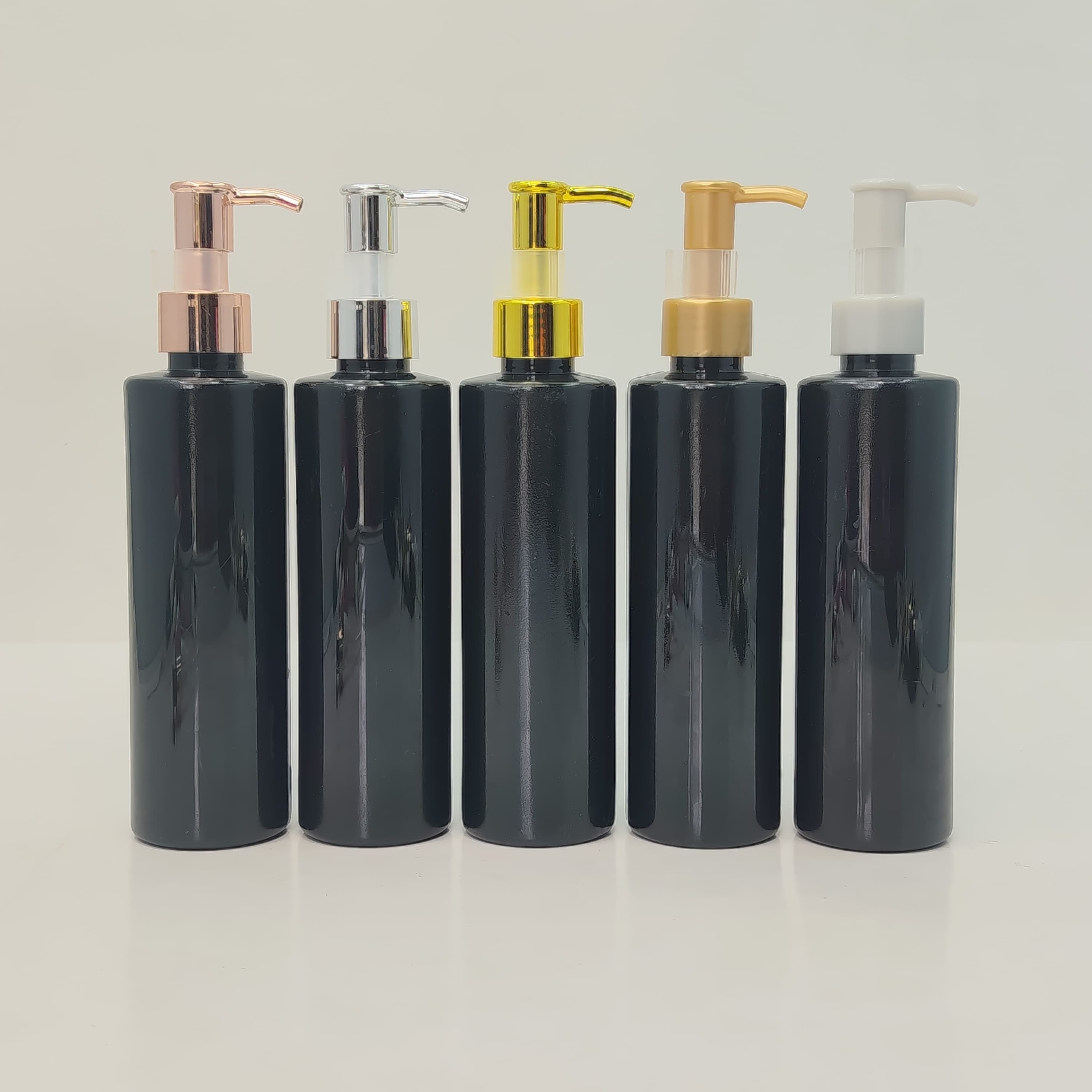 Main image of 200ml Round Black Bottle - Long Neck Pumps  