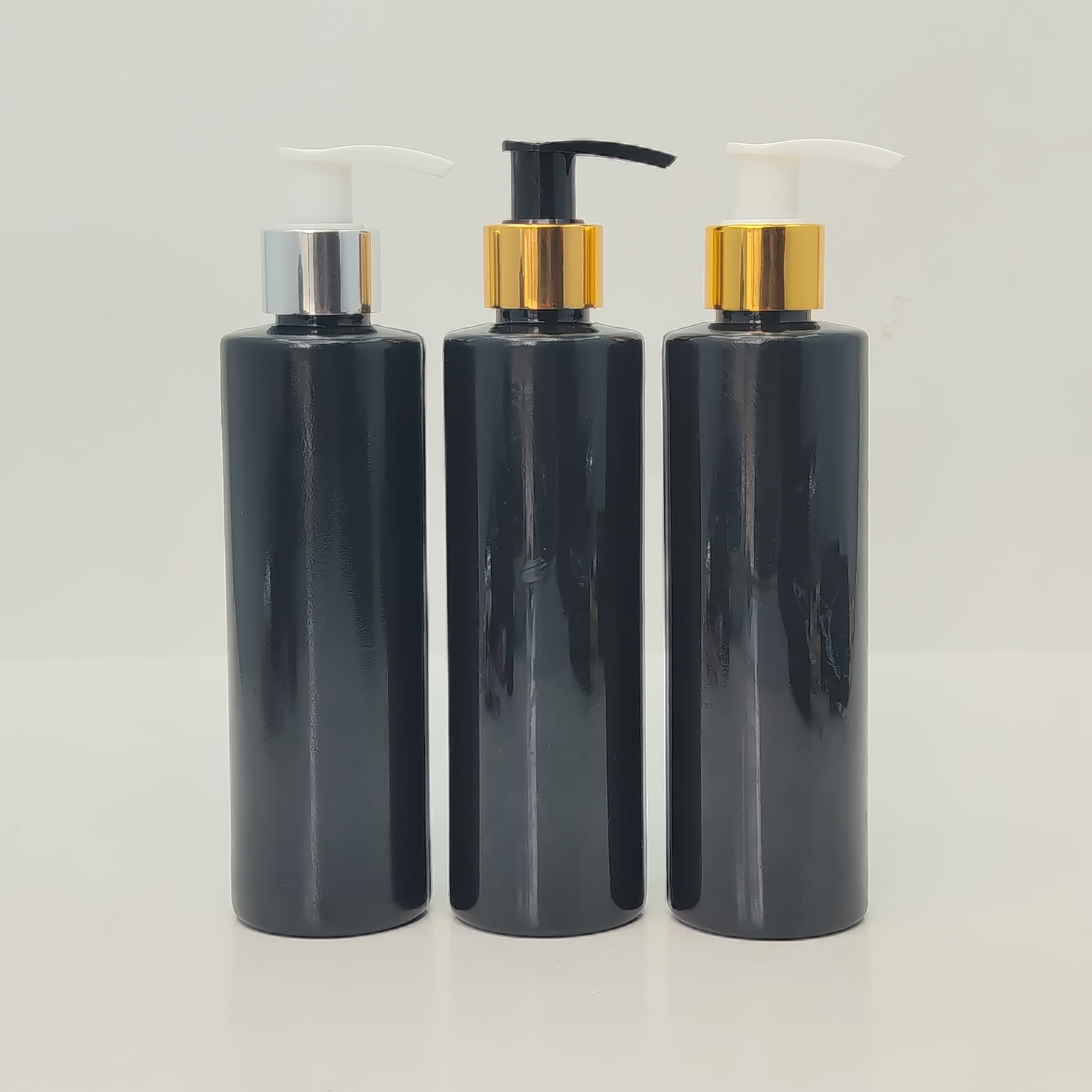 Main image of 200ml Round Black Bottle - Alu Pumps 
