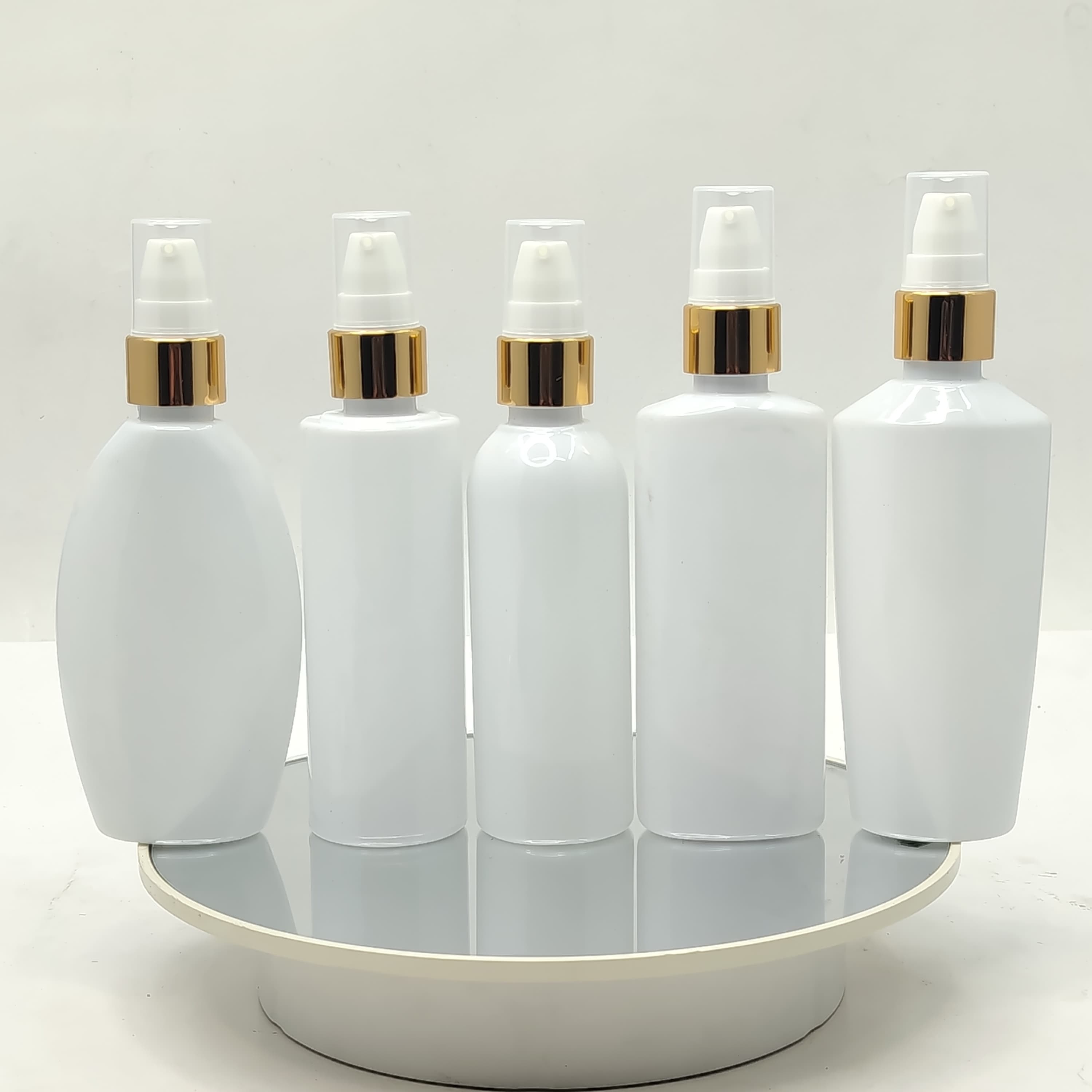Main image of 100ml Milk White Bottle - Drop Pump Gold