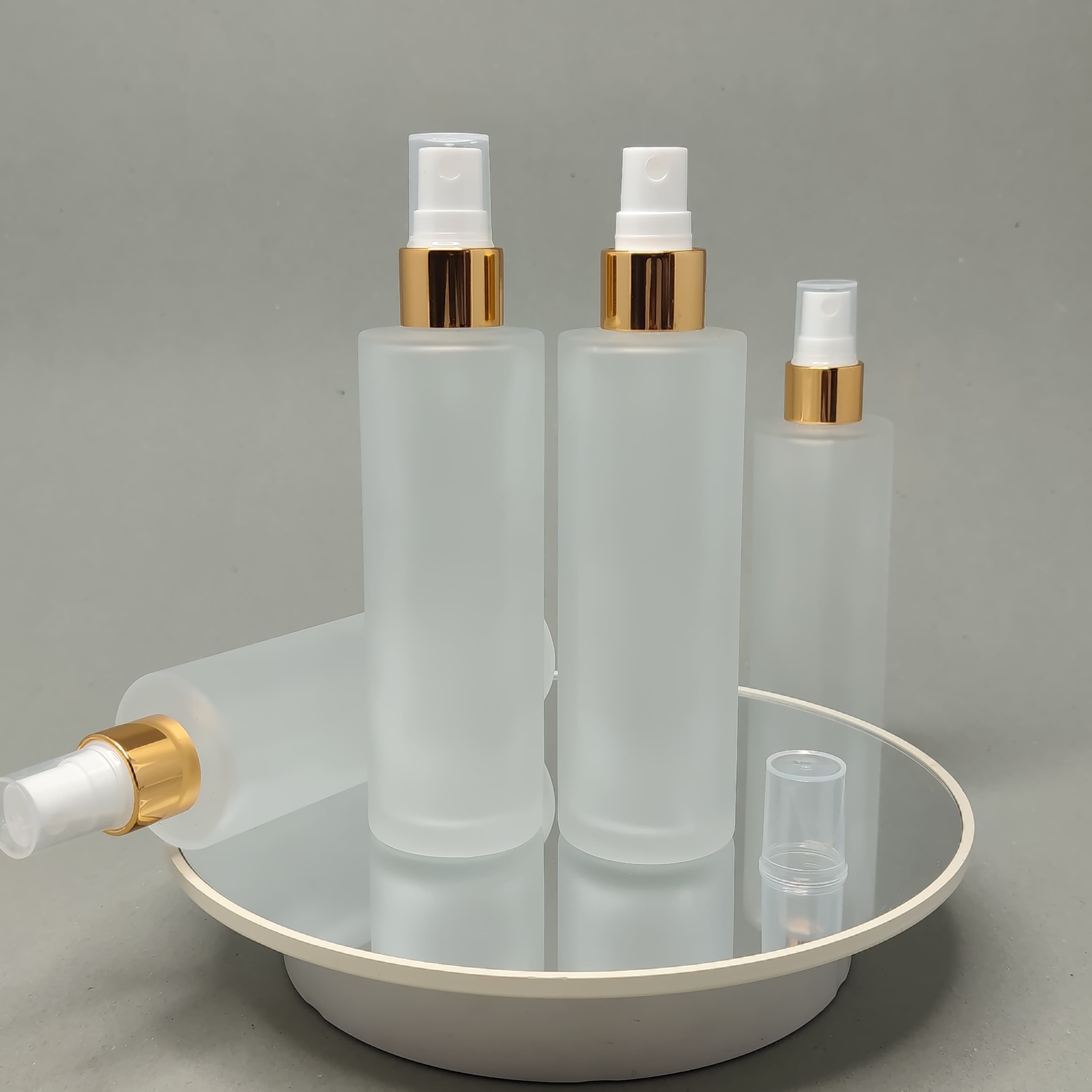 Main image of 100ml Frosted Glass Bottle - Gold Sprayer 